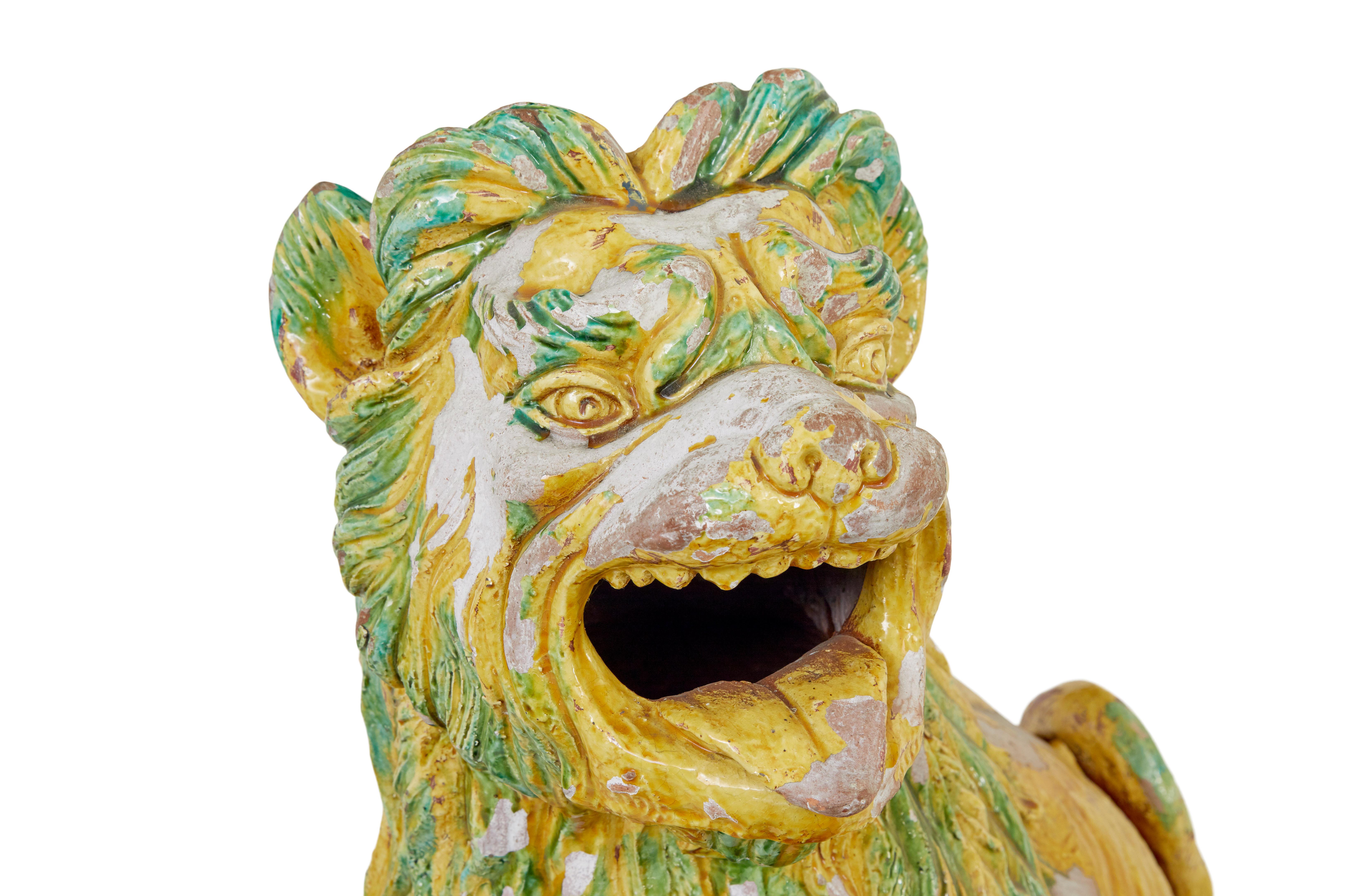 20th Century Large pair of mid 20th century Indonesian salt glazed decorative dogs For Sale