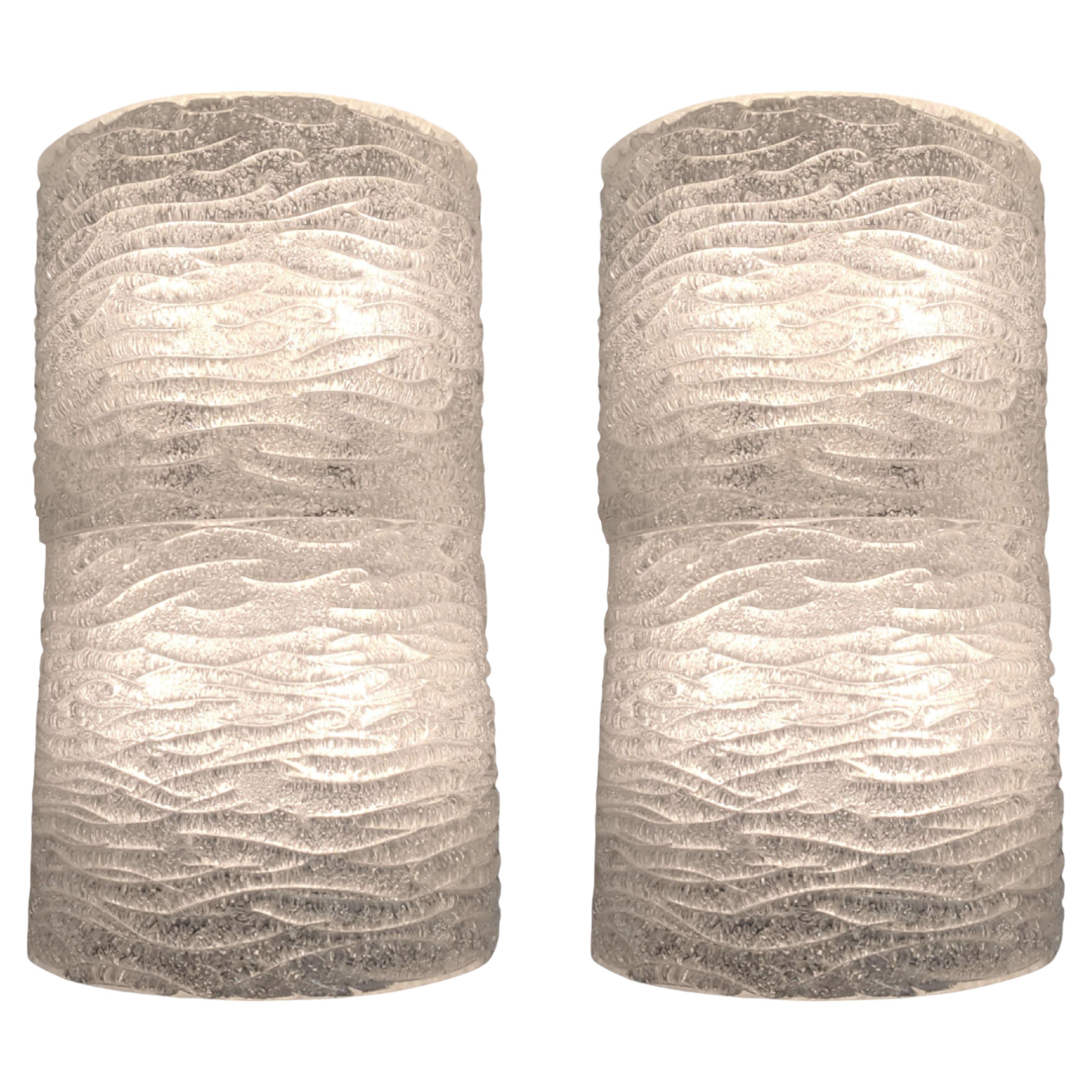 Large pair of Mid Century Modern frosted white textured and ribbed wall sconces For Sale