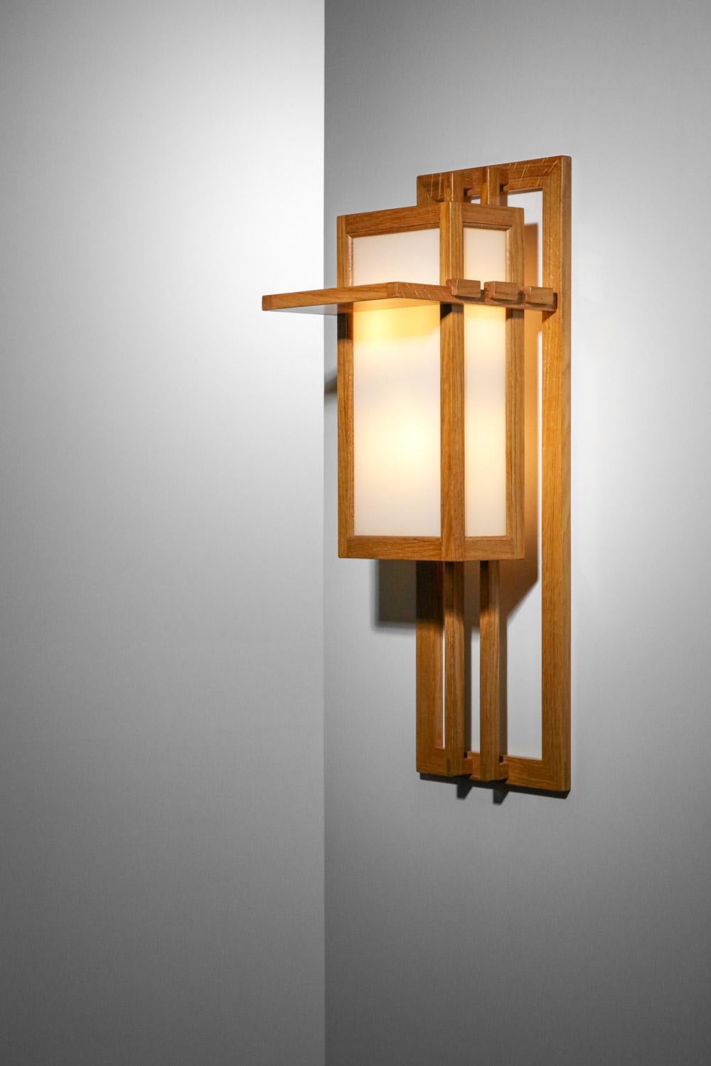 Mid-20th Century large pair of modernist wood and glass sconces Frank Lloyd Wright style