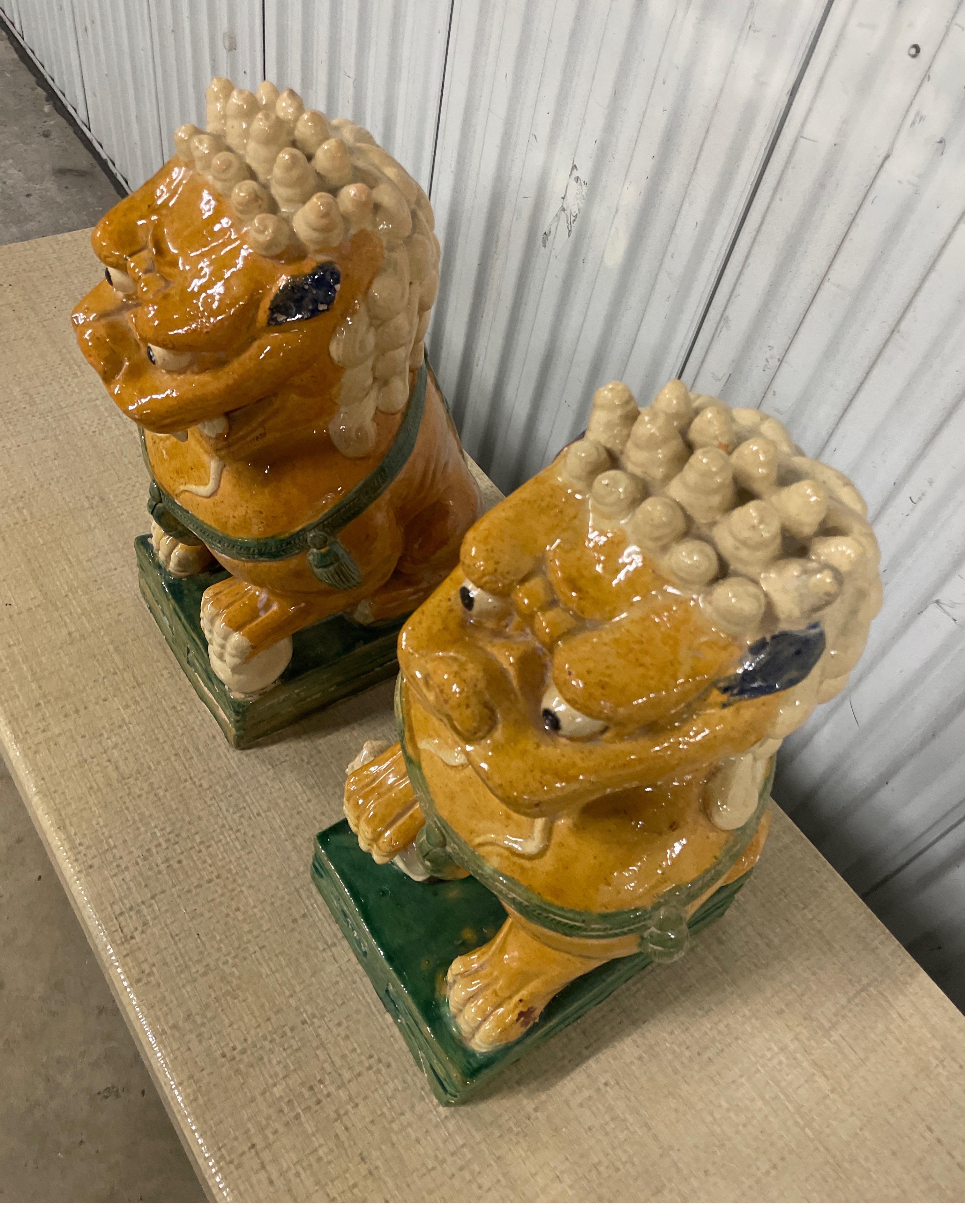 Terracotta Large Pair of Multicolored Glazed Terra Cotta Foo Dogs For Sale