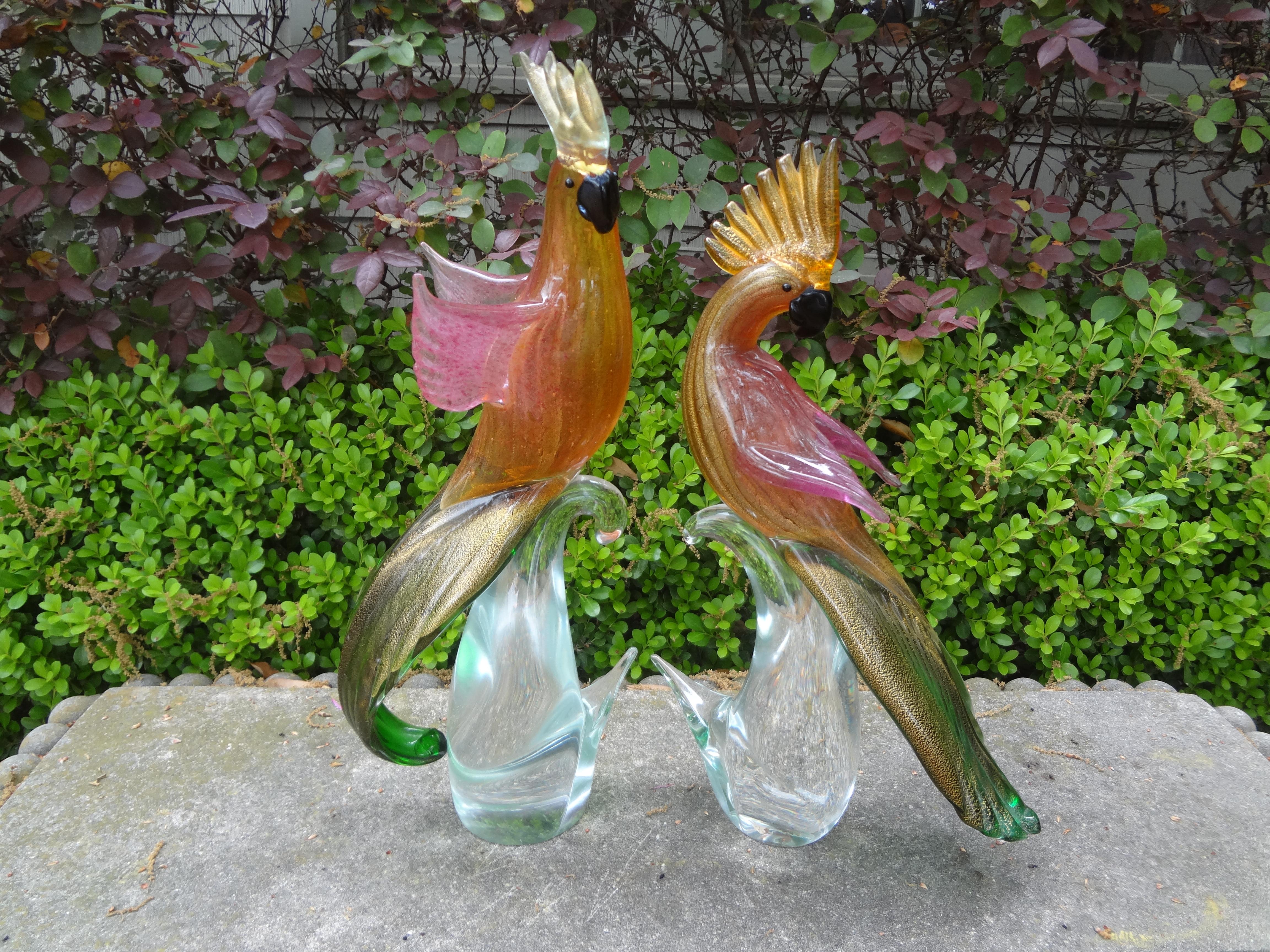 Large Pair Of Murano Glass Cockatiels Or Parrots.
This lovely pair of Murano glass cockatiels, parrots or birds were executed in several colors with internal gold inclusions with attention to detail.
Our beautiful Italian Murano glass sculptures are