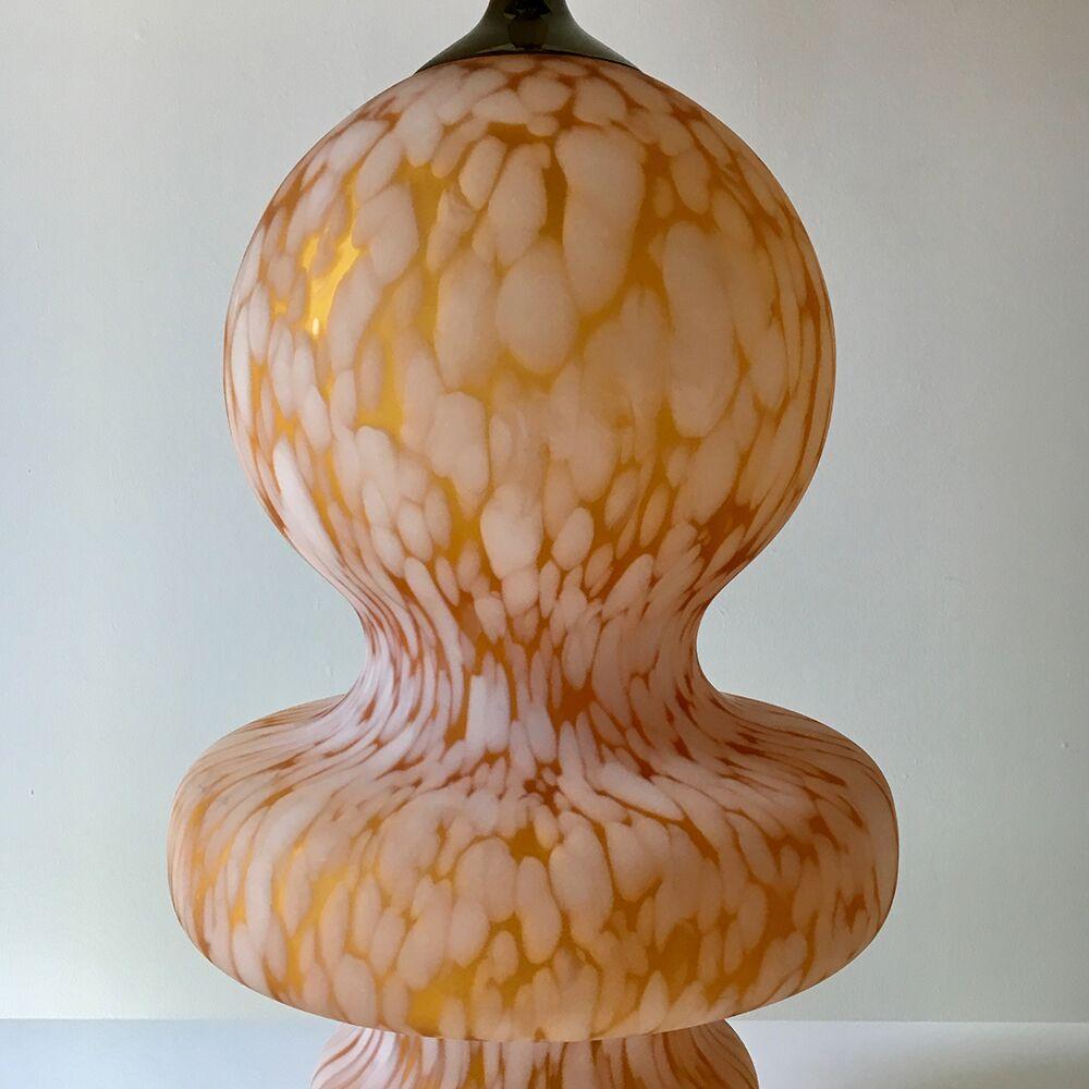 Impressive pair of large hand blown amber Murano glass table lamps with white cumulus detailing and brass metalwork, 1970s.

Custom made orange shades included.
Width at the widest point is 11 ins (28 cms).