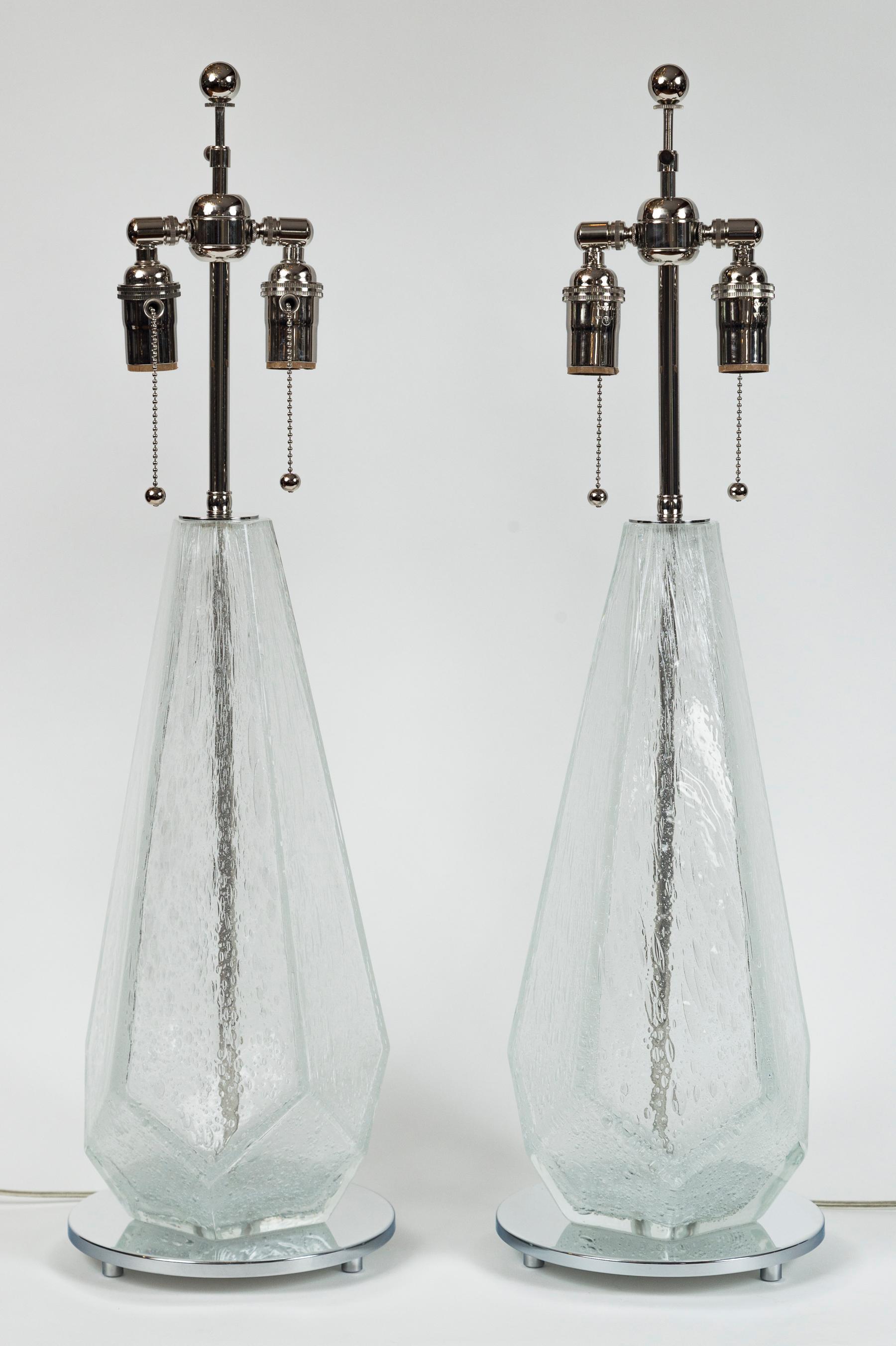 Elegant pair of of light white blown pulegoso  (white bubbles suspended in the glass) faceted table  lamps with nickel bases

Electrified to US code with nickel lamping, adjustable shade mechanism and 2 medium base sockets

*Heavy lamps 25lbs