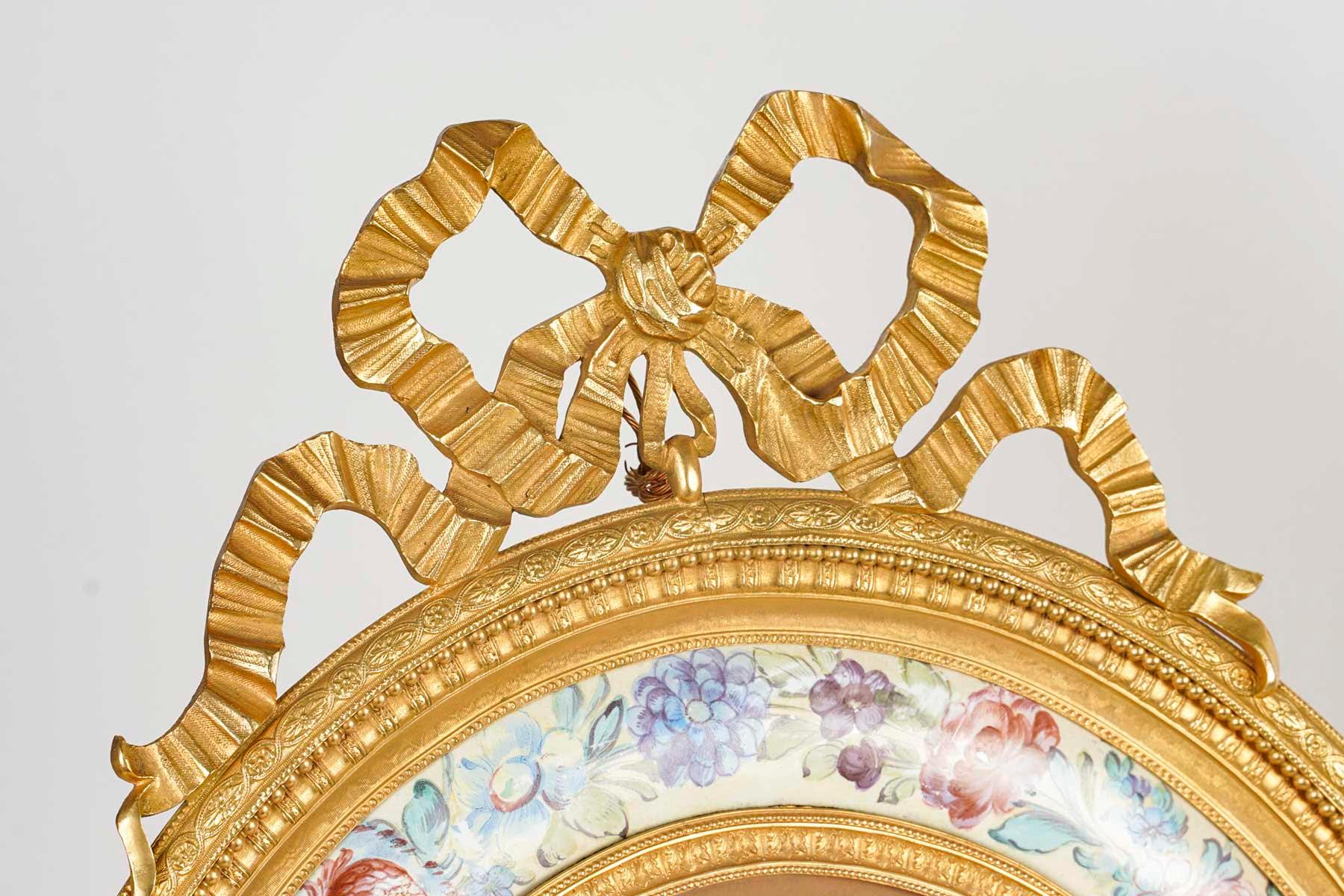 Large pair of Napoleon III period gilt bronze and enamelled picture frames.

A pair of large Napoleon III period Louis XVI style gilt bronze and enamelled picture frames.
H: 55cm, W: 40cm, D: 4cm
