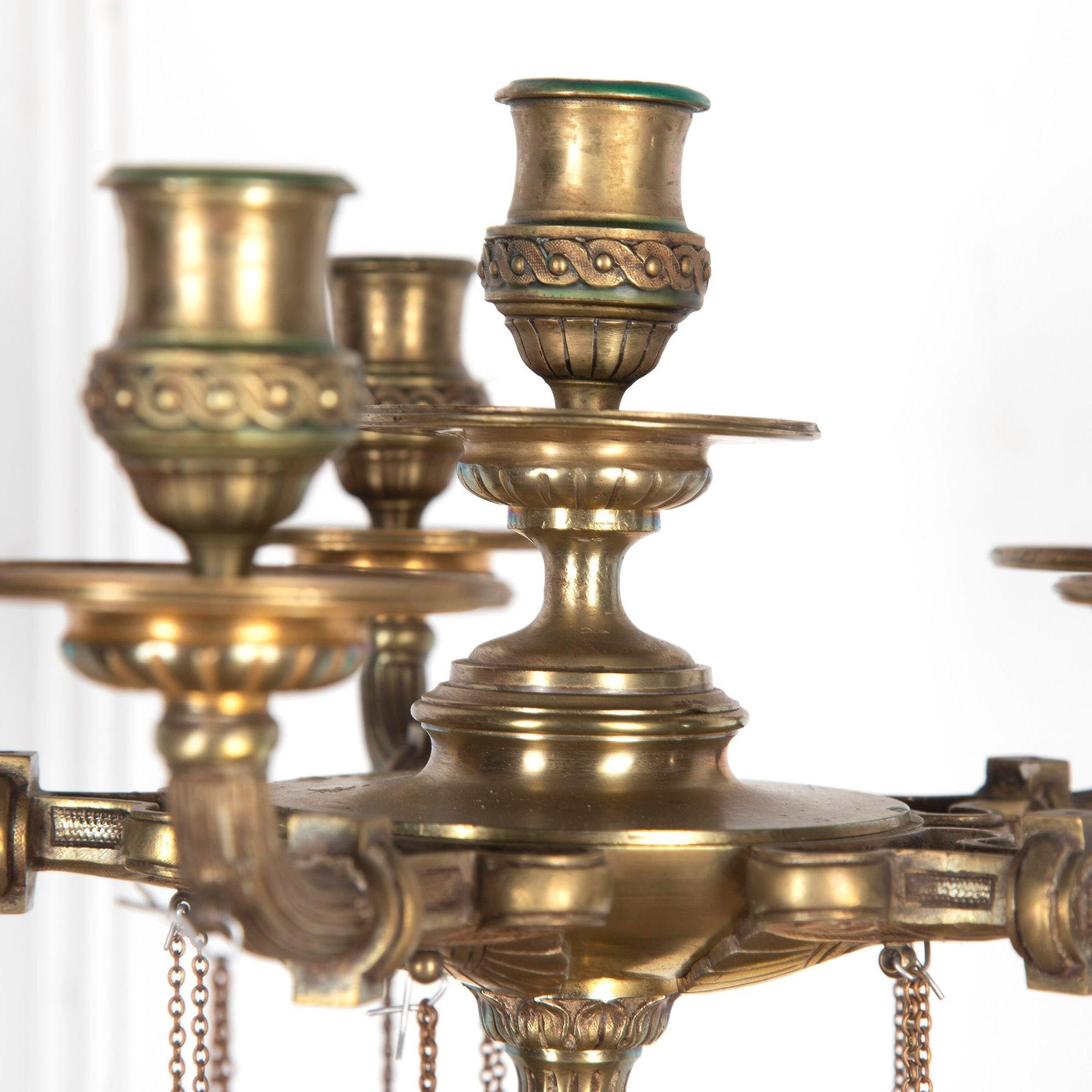 Magnificent pair of large 19th century candelabras in the neoclassical style.
Each with fluted stems and is beautifully decorated with acanthus leaves shells and chains, resting on tripod claw feet.
Perfect for displaying on a mantlepiece or