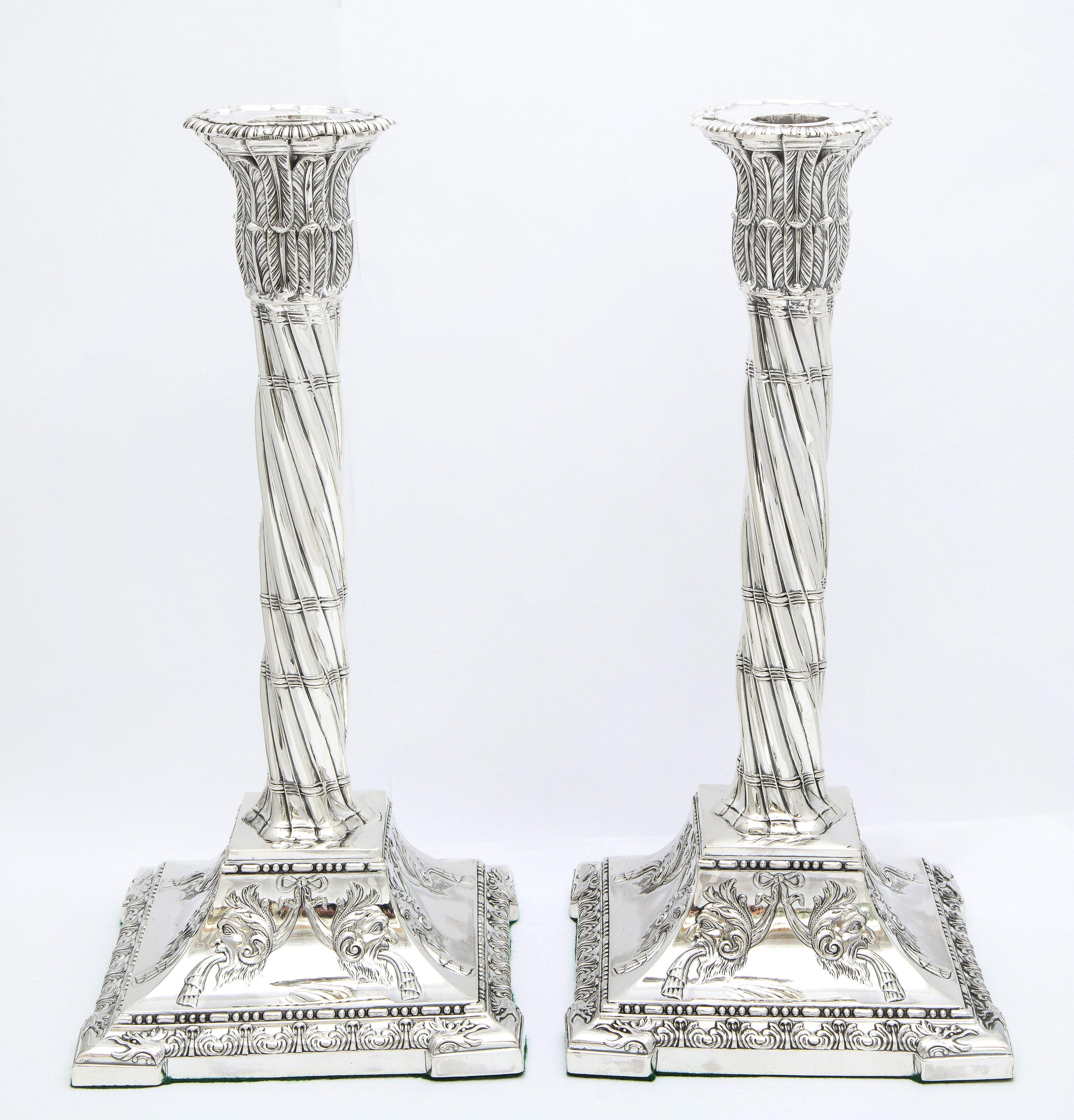 Large pair of Neoclassical (made in the Victorian Period), sterling silver column-form candlesticks, Sheffield, England, year-hallmarked for 1898, Henry Wigful - maker. Each candlestick measures 11 1/6 inches high x 5 1/4 inches deep x 5 1/4 inches