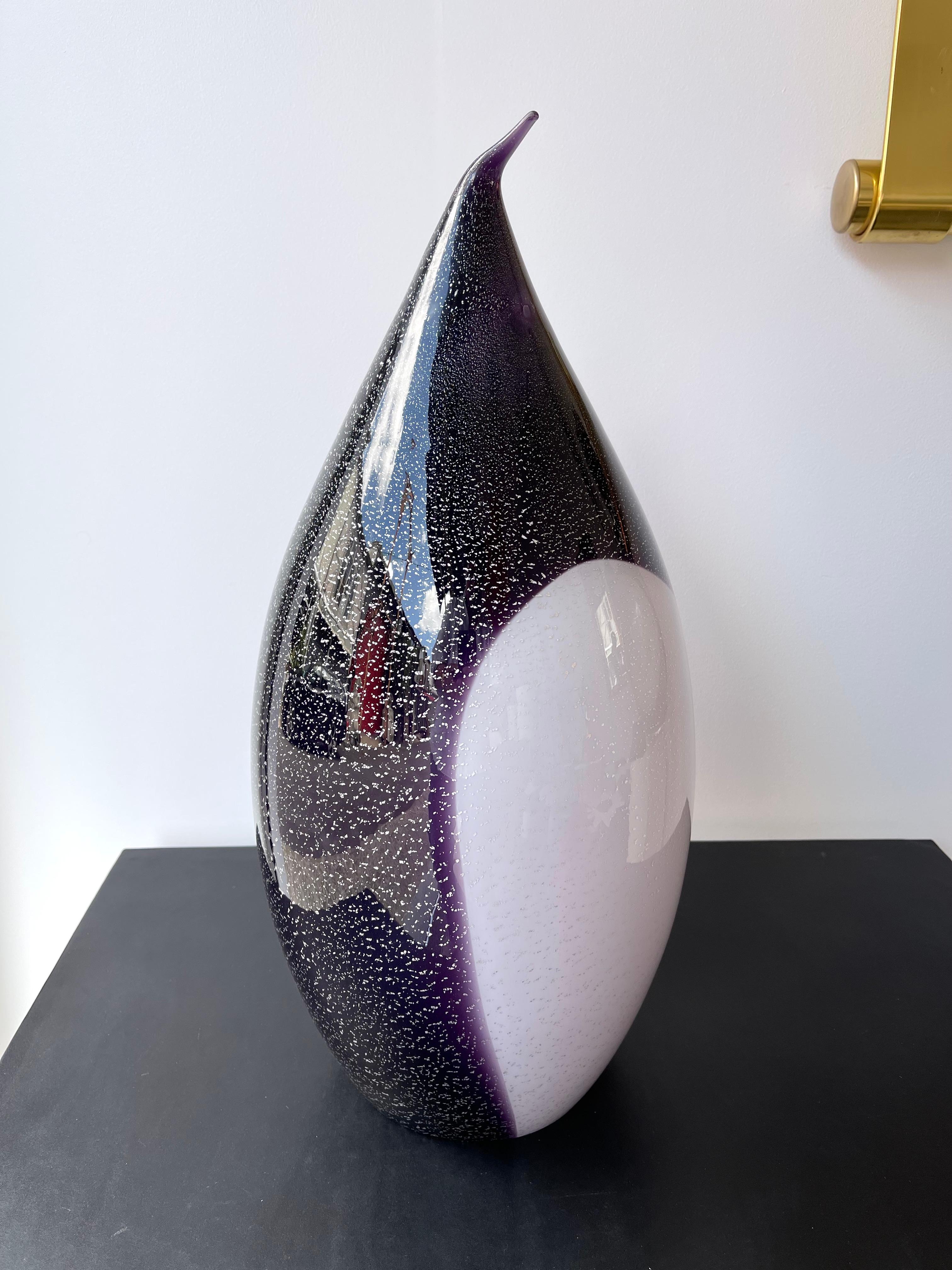 Mid-Century Modern large Pair of Penguin table or bedside lamps in black, purple and white blown Murano glass with silver leaf. Slight diffrences as indicated on the original tag its an artisanal hand made work.  In the mood of italian design