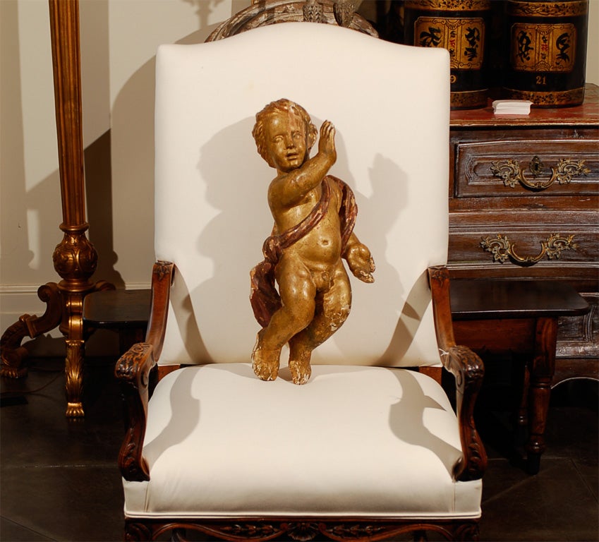 Large pair of giltwood carved Puttis / Cherubs with lovely faces.