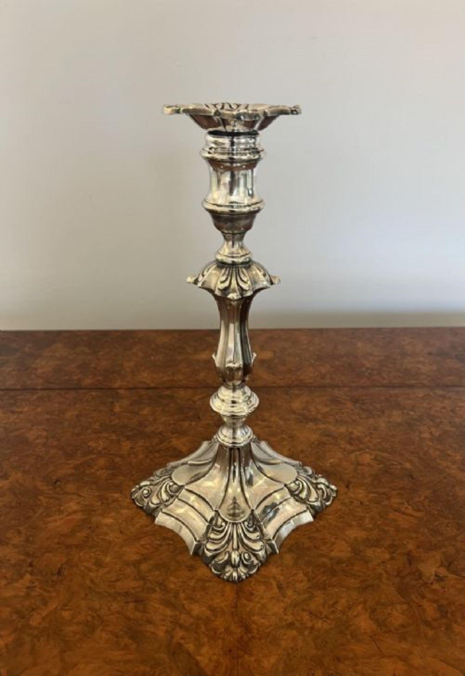 Large pair of quality Victorian Sheffield Plated Ornate Candlesticks having a quality pair of antique Victorian Sheffield plated ornate candlesticks with tapering columns and raised on ornate foliate shaped bases 