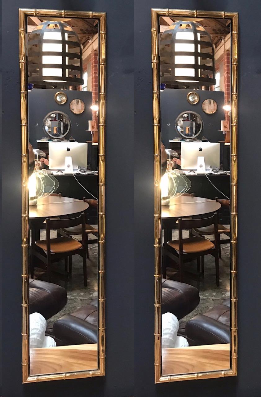 Large pair of rectangular faux bamboo brass mirrors, Italy, 1960s.