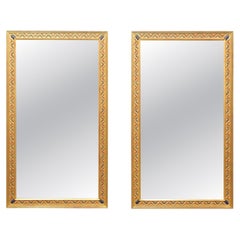 Large Pair of Richly Decorated Gilt Mirrors