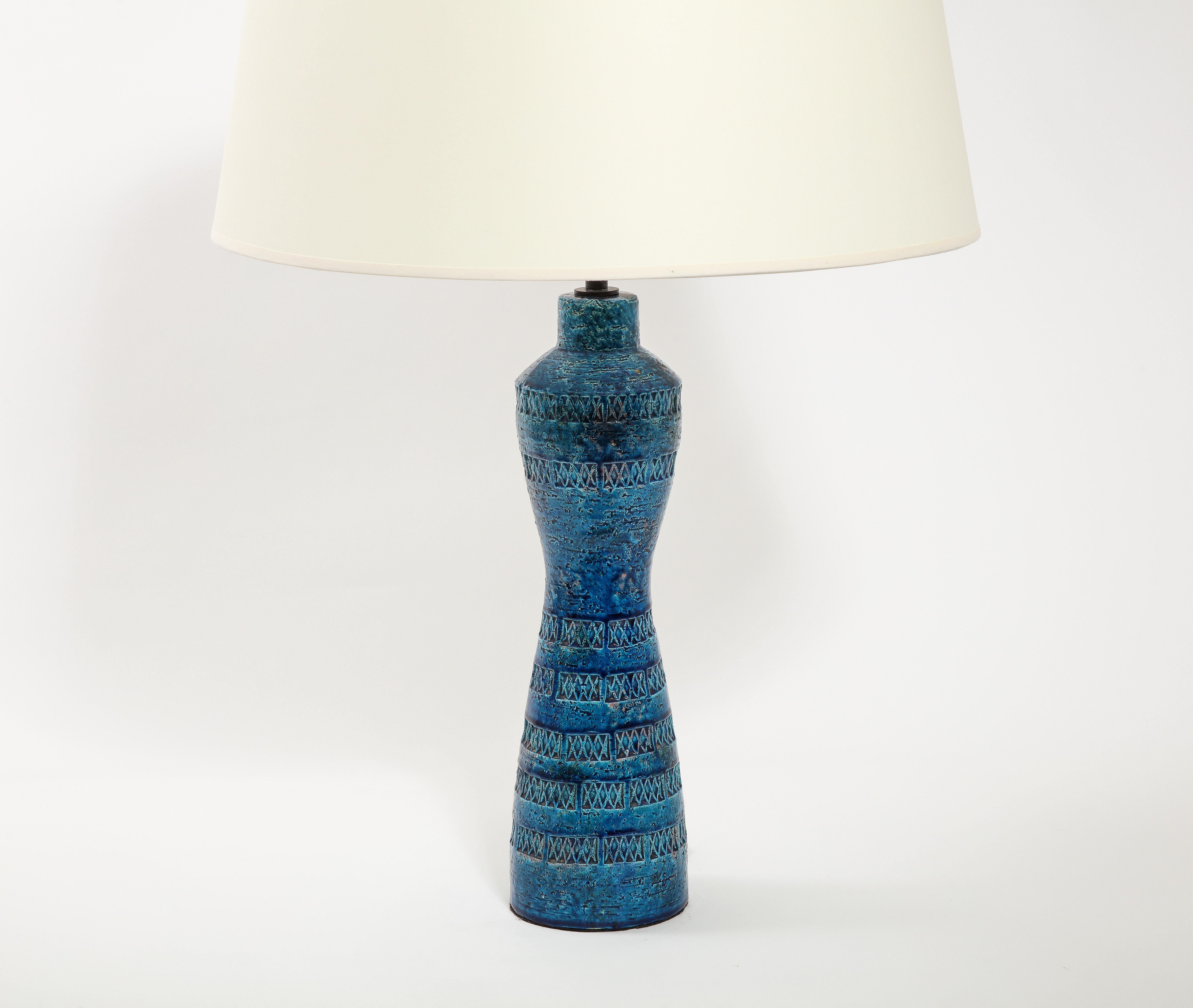 Exceptional pair of ceramic lamps by Bitossi in the Rimini colorway with detailed incising. The size is for the base only. Shades are not included.
