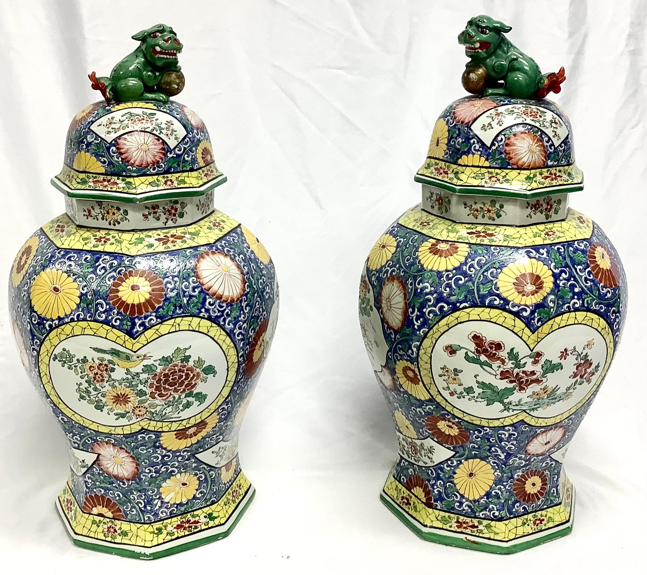 A very fine pair of Sampson style Chinese porcelain vases, blue background with multicolored floral and bird motif. Excellent quality workmanship, bright and vivid color throughout.