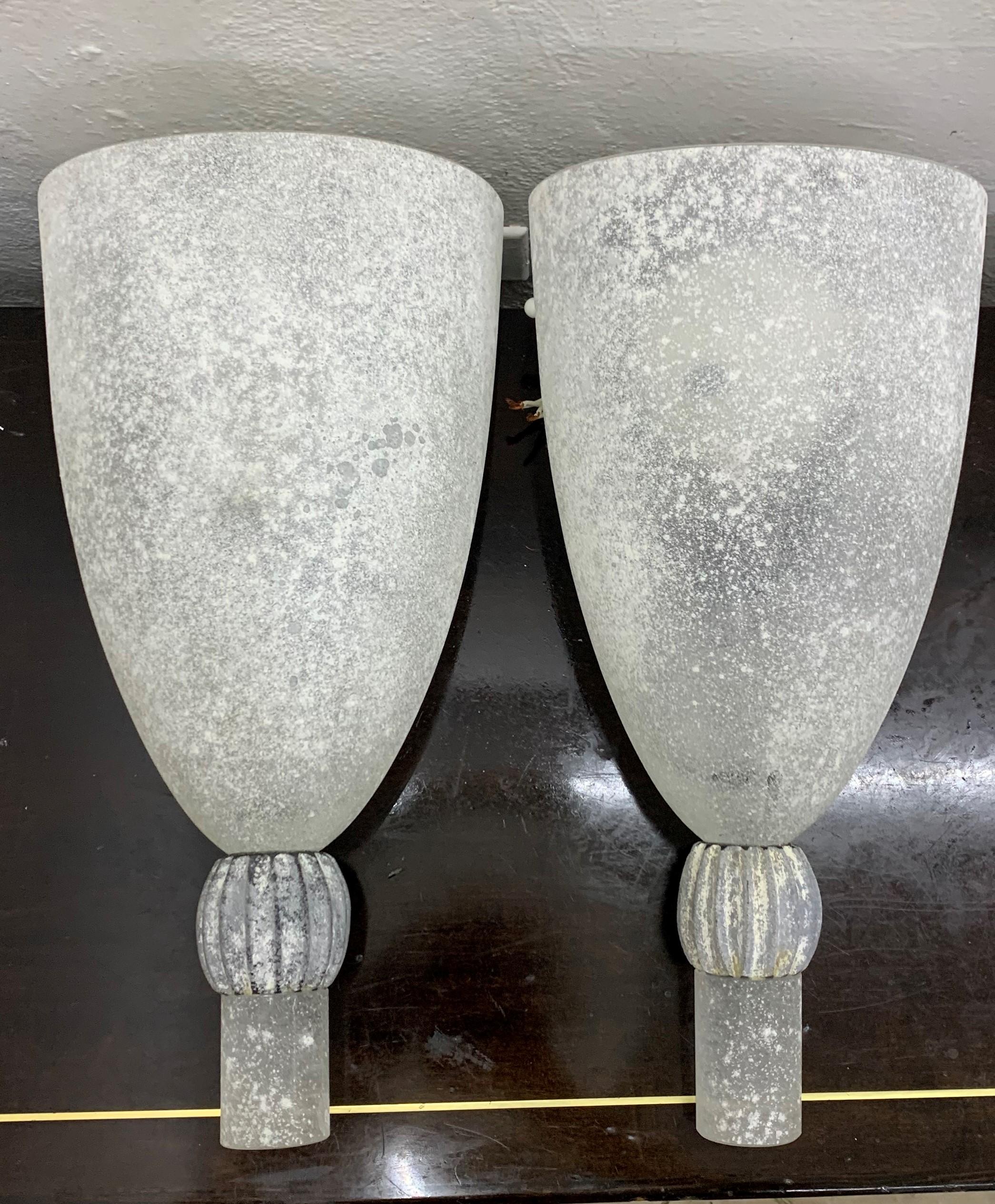 Very Large pair of wall lights manufactured in clear and black Murano glass using the Scavo technique.
Both still holding the original sticker and in great condition.
 
 