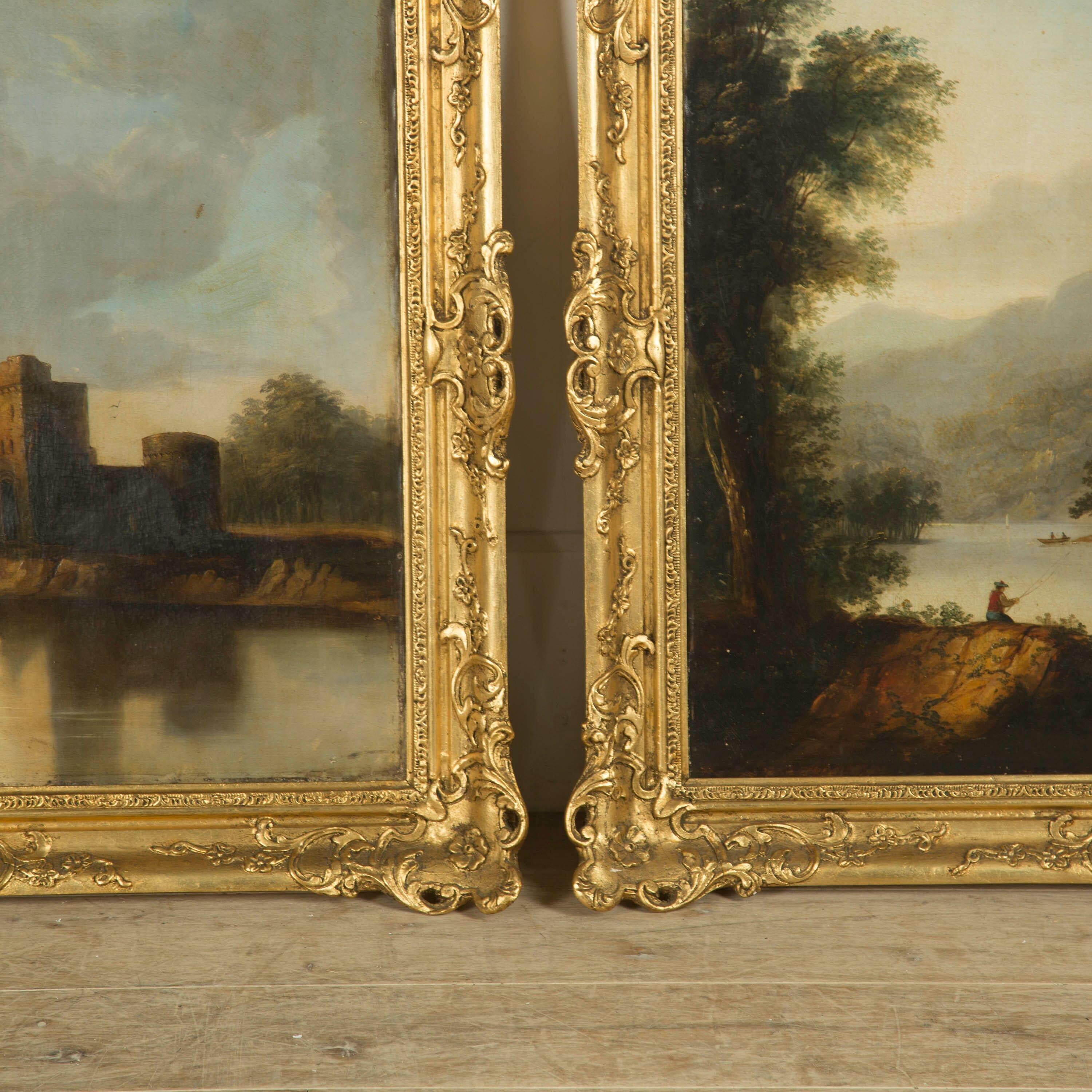 A large pair of Scottish 19th century oil on canvas Country House paintings of a castle above a loch and a ruined church.