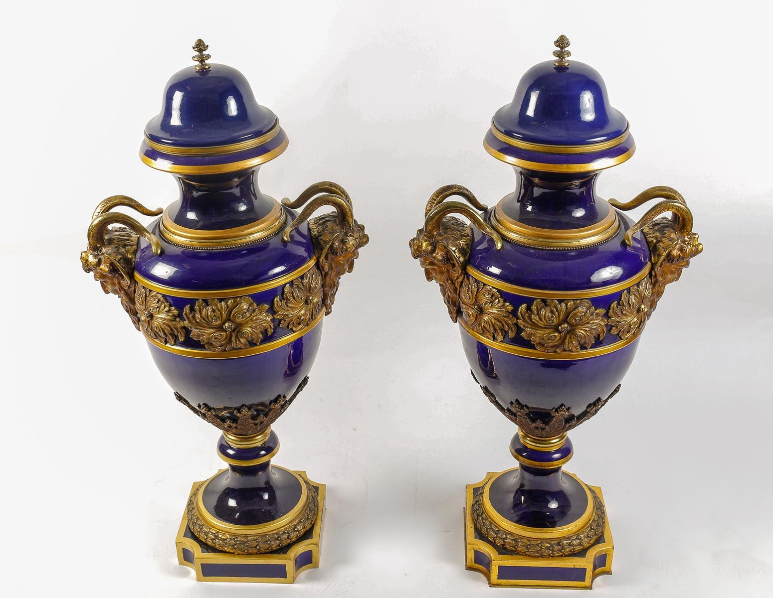 Large Pair of Sèvres Porcelain Covered Vases.

Large pair of covered vases in Sèvres porcelain, cobalt blue with gold highlights and patinated gilt bronze, 19th century, Napoleon III period.    

h: 104cm , w: 53cm, d: 34cm