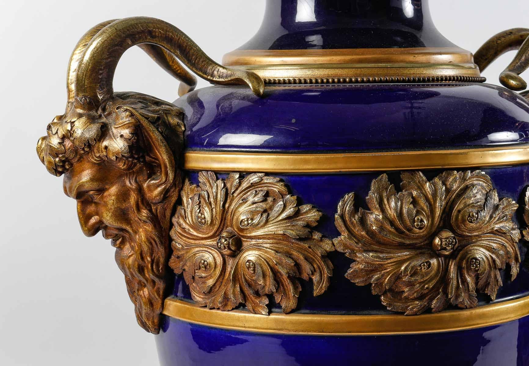 Gilt Large Pair of Sèvres Porcelain Covered Vases. For Sale