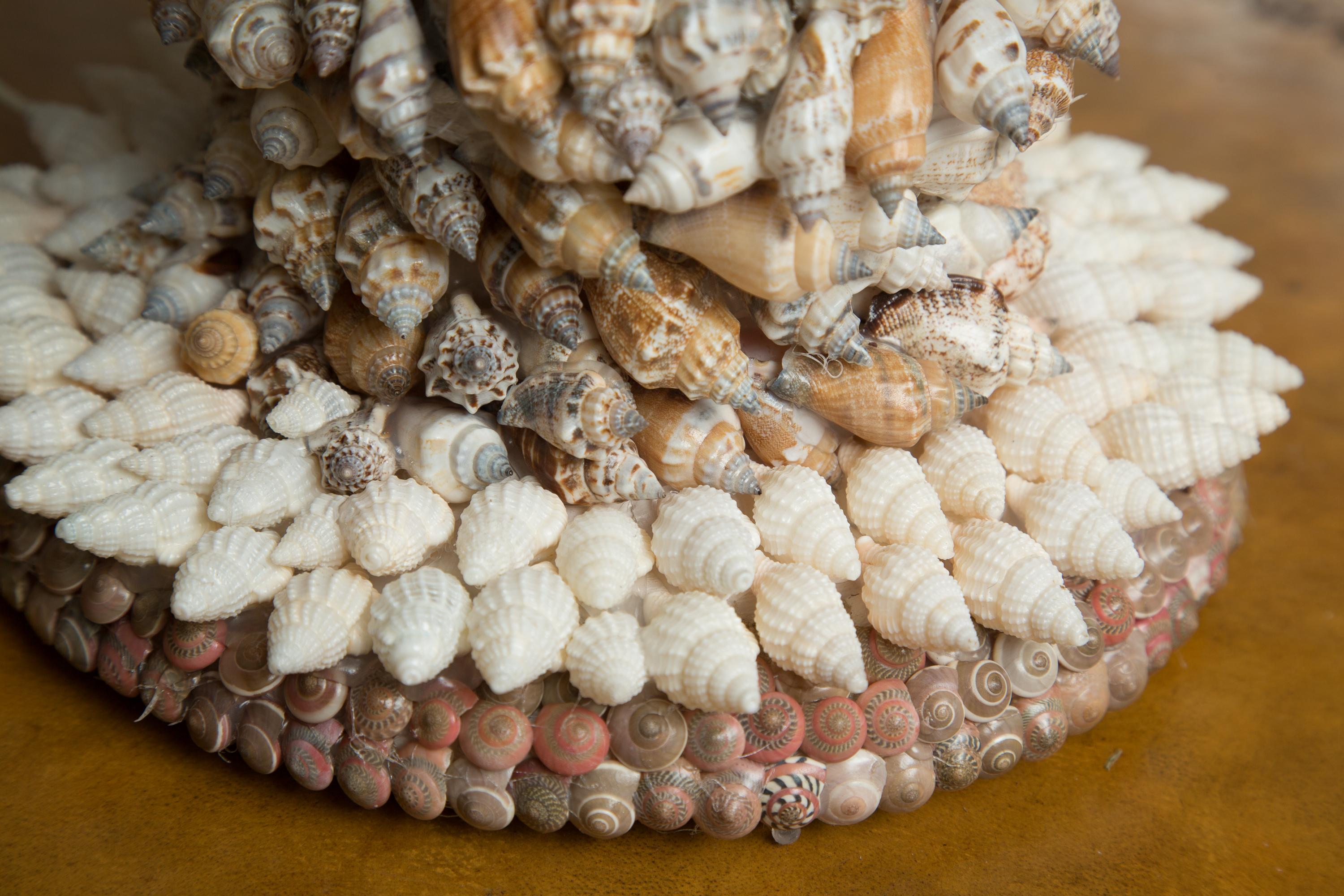 Handmade natural seashell encrusted table lamp.
Sold individually.