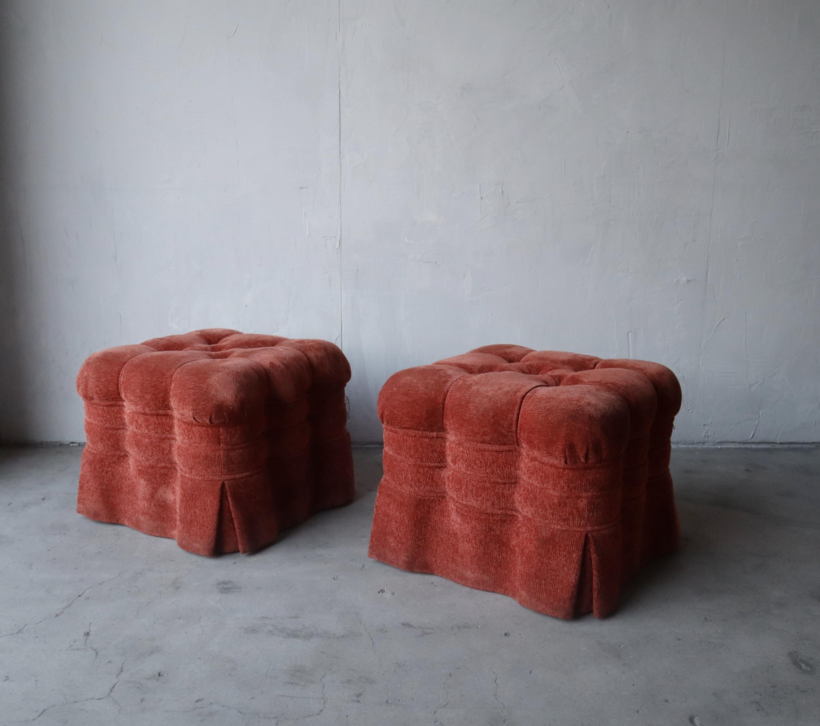 Paprika perfection. This fun pair of skirted ottomans are big in size (2ft x 2ft) and style. The deep biscuit tufting, scallop edges and skirting really sets these beauties off. Use as mere decor or comfy extra seating. 

These 2 are heavy, truly