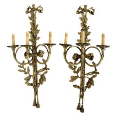 A Large Pair of Solid Brass Three-Arm Trumpet Form Wall Sconces