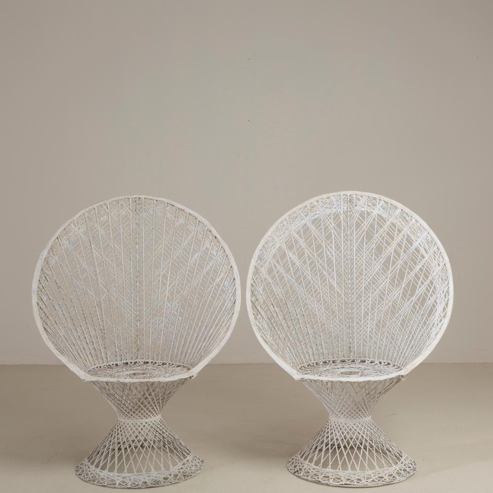 Large pair of spun resin fantail backed chairs on circular bases, 1960s.
  