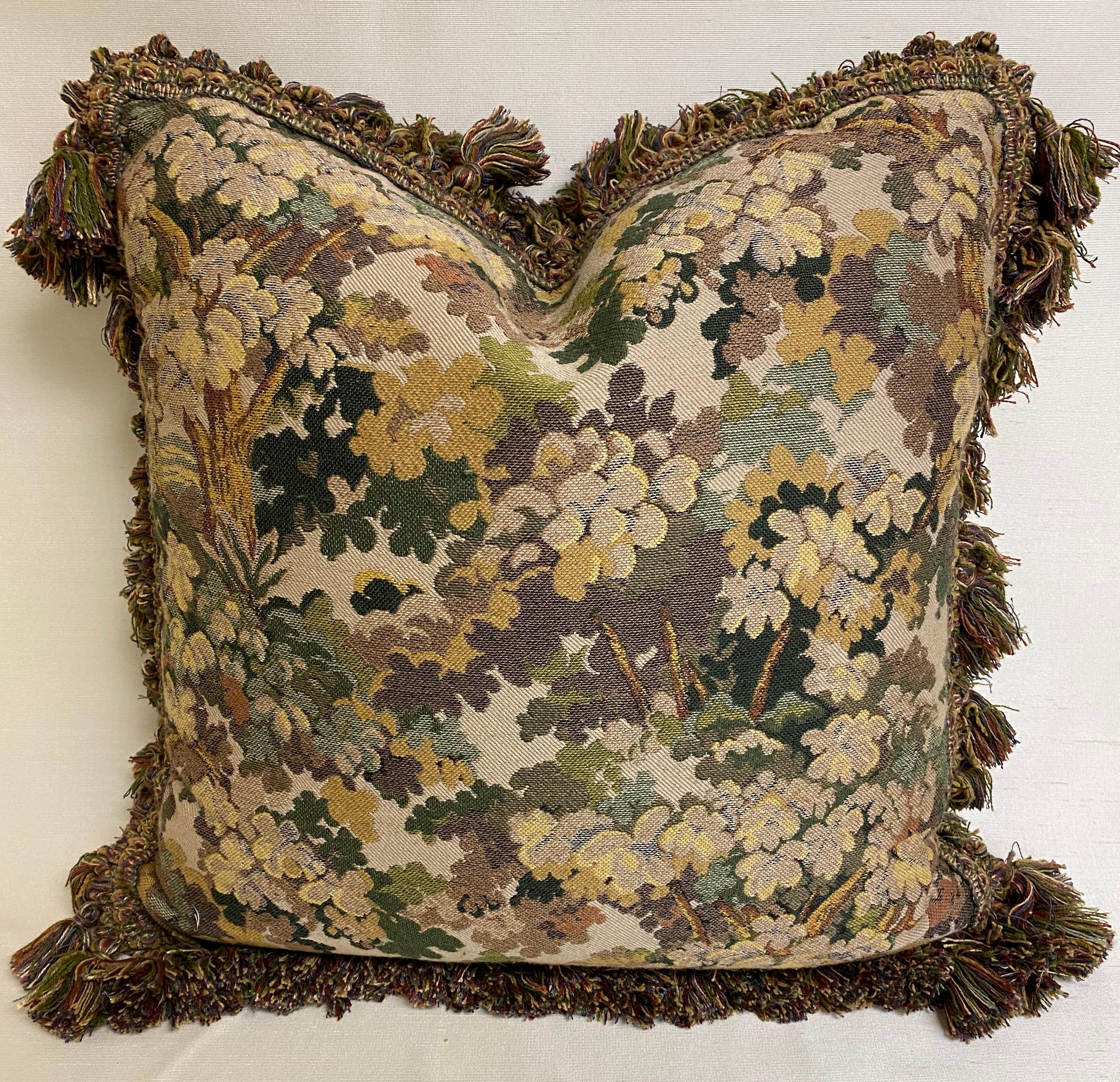 Large pair of verdure tapestry style down-filled cushions with fringe.
Measures: 23 inches square.
