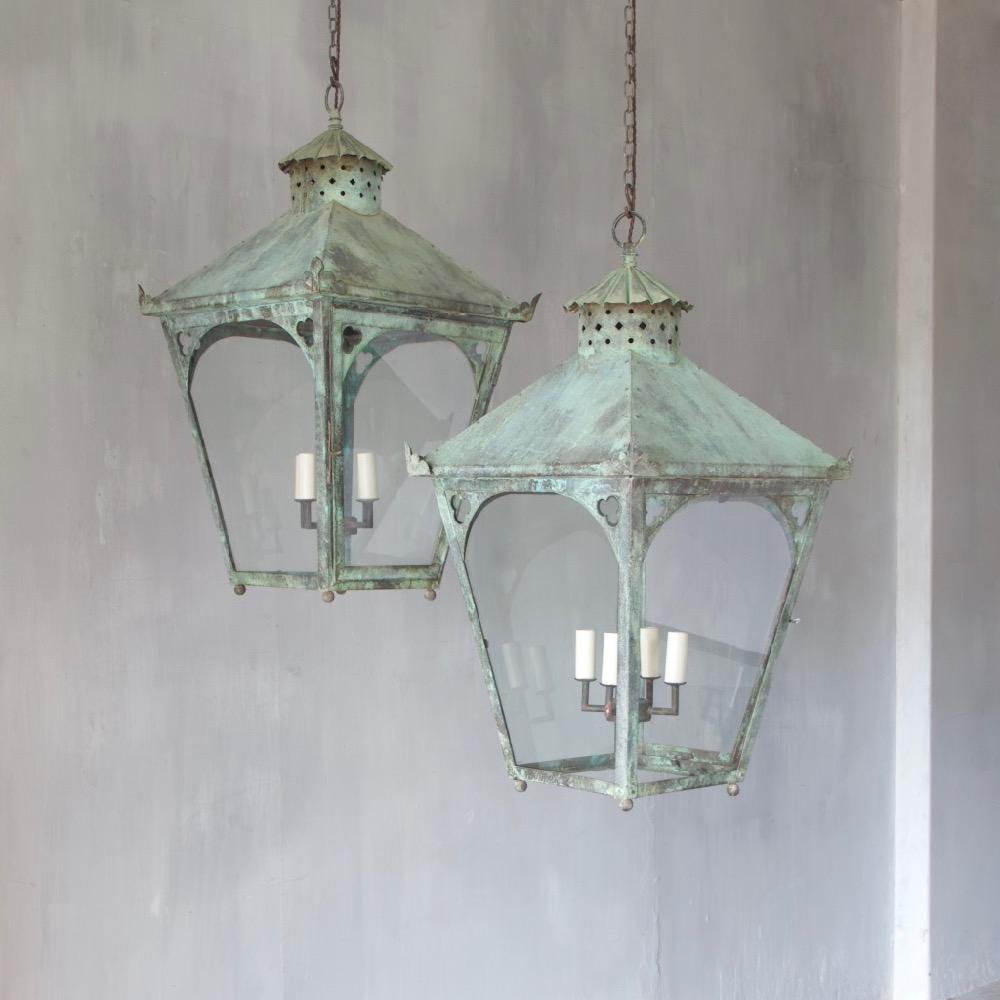 A very large pair of verdigris copper lanterns with simple Gothic decoration, England, circa 1940.
