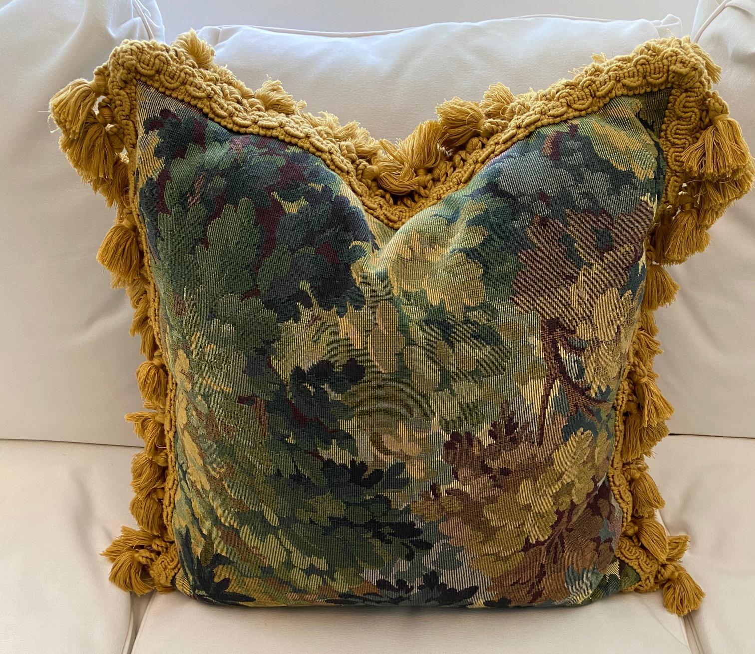 Decorative pair of verdure tapestry style cushions with gold fringe.
Measures: 20