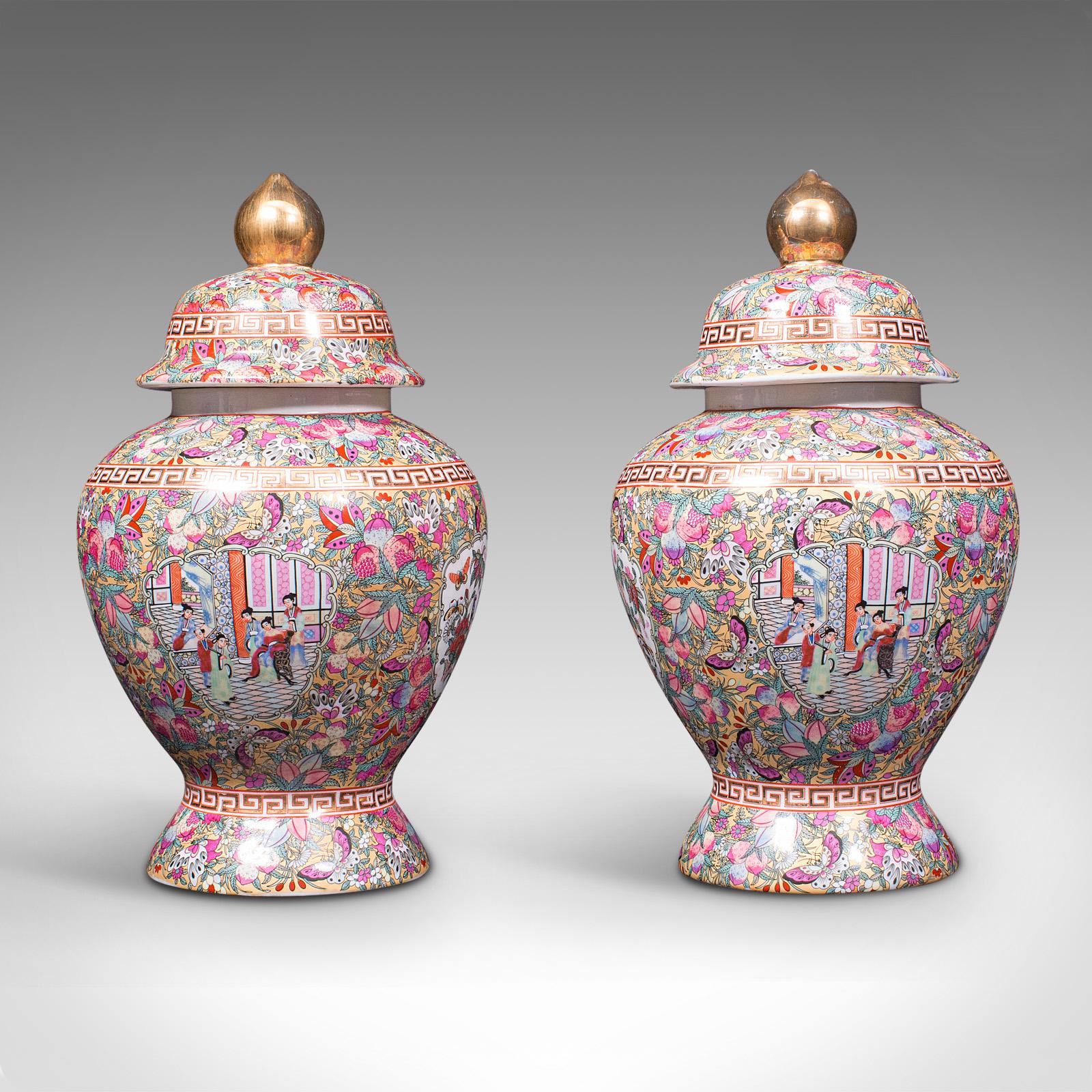 This is a large pair of vintage ginger jars. A Chinese, ceramic baluster or spice jar with profuse decoration, dating to the Art Deco period, circa 1940.

A treat of colour and fine detail upon large proportions
Displaying a desirable aged patina