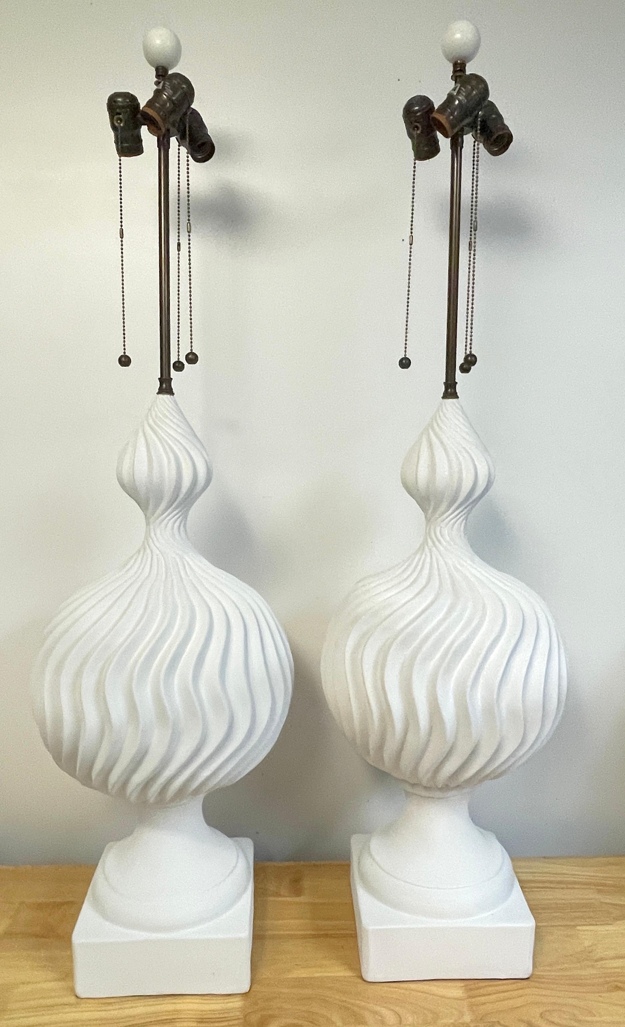 Large pair of white lacquered plaster sculptural orb lamps, by Lang Levin
Each one a substantial sculpture, Reminiscent of Michael Taylor's designs. 
Each one standing 44-inches high (28