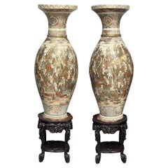 Large pair Satsuma vases on hardwood stands, circa 1880. 186cm