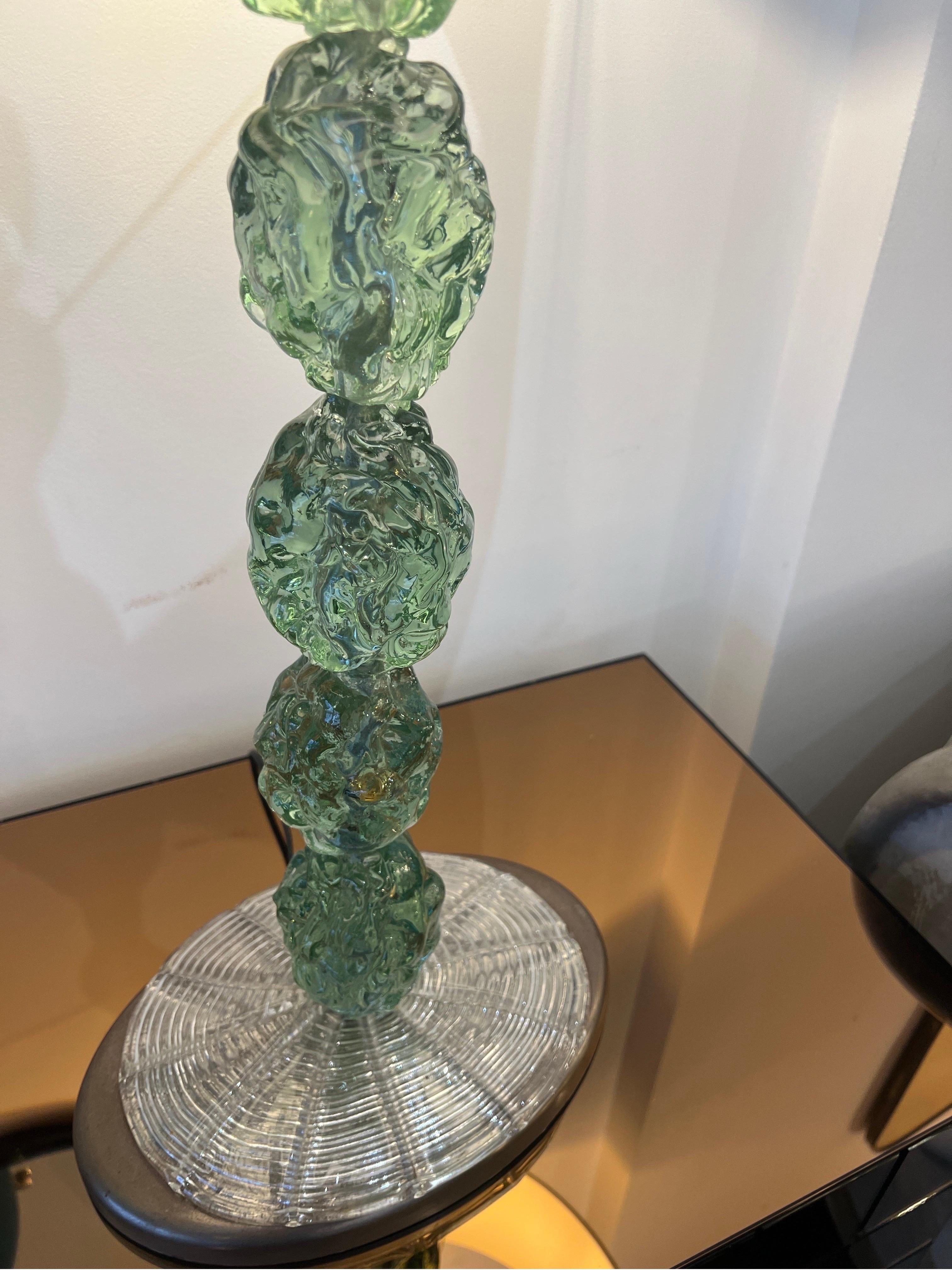 A sculptural pair of Venetian sea green Murano glass table lamps with forest green velvet shades. (Optional) 
C1980 Murano 
Measurements with shades: 34.5 (inches) tall 
