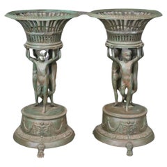 Large Pair Verdigris Finished Cast Metal Figural Planters after Clodion