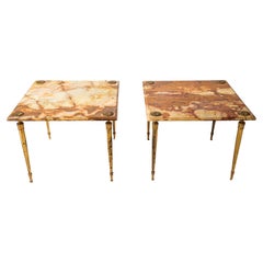 Large paired side tables with onyx