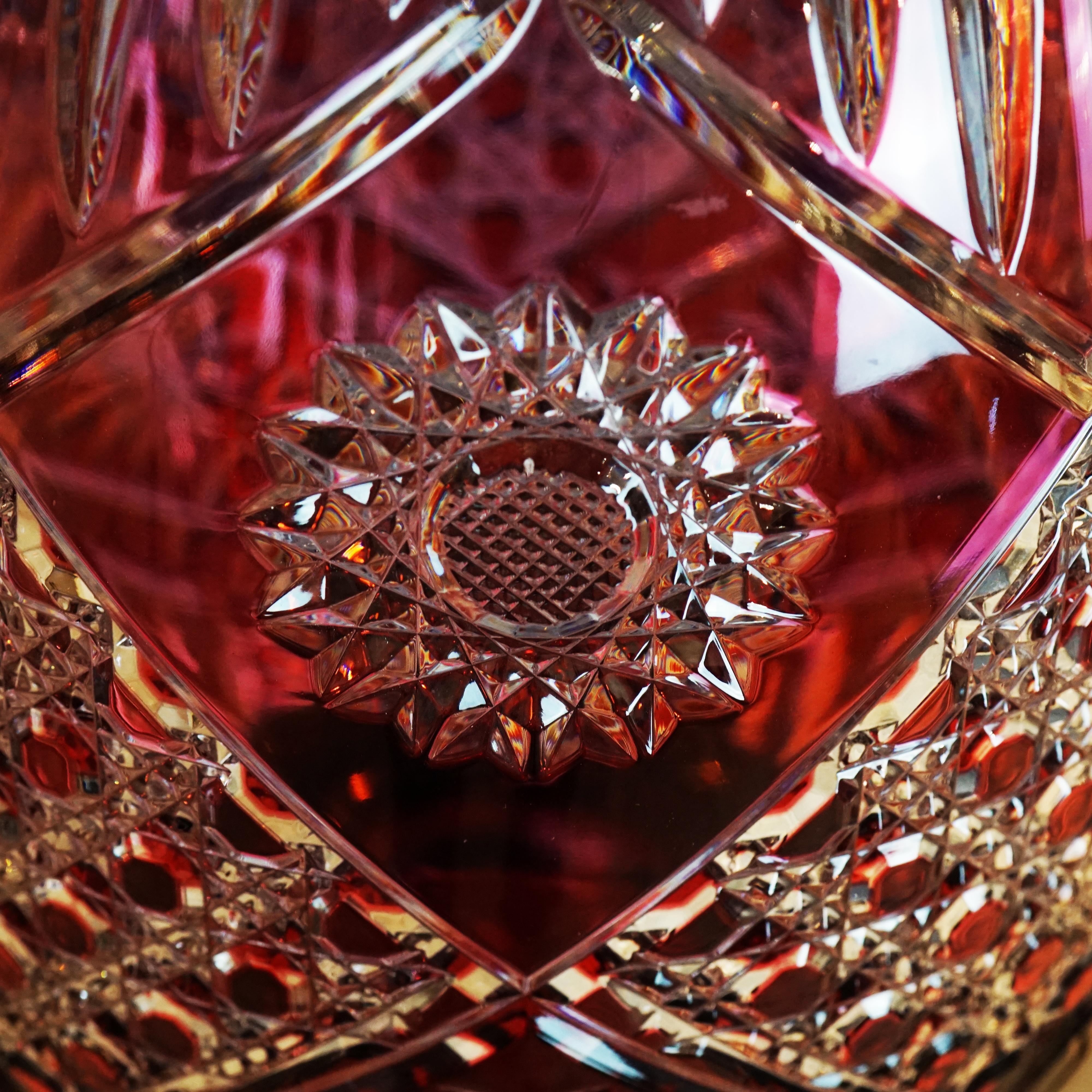 Large palm tree vase in crystal and black chrome bronze produce in France.

Measurements: H 190 cm

Majestuous red crystal vase embellished with black chrome covered bronze.

The crystal is blown mouth and handcut in our factories in Eastern