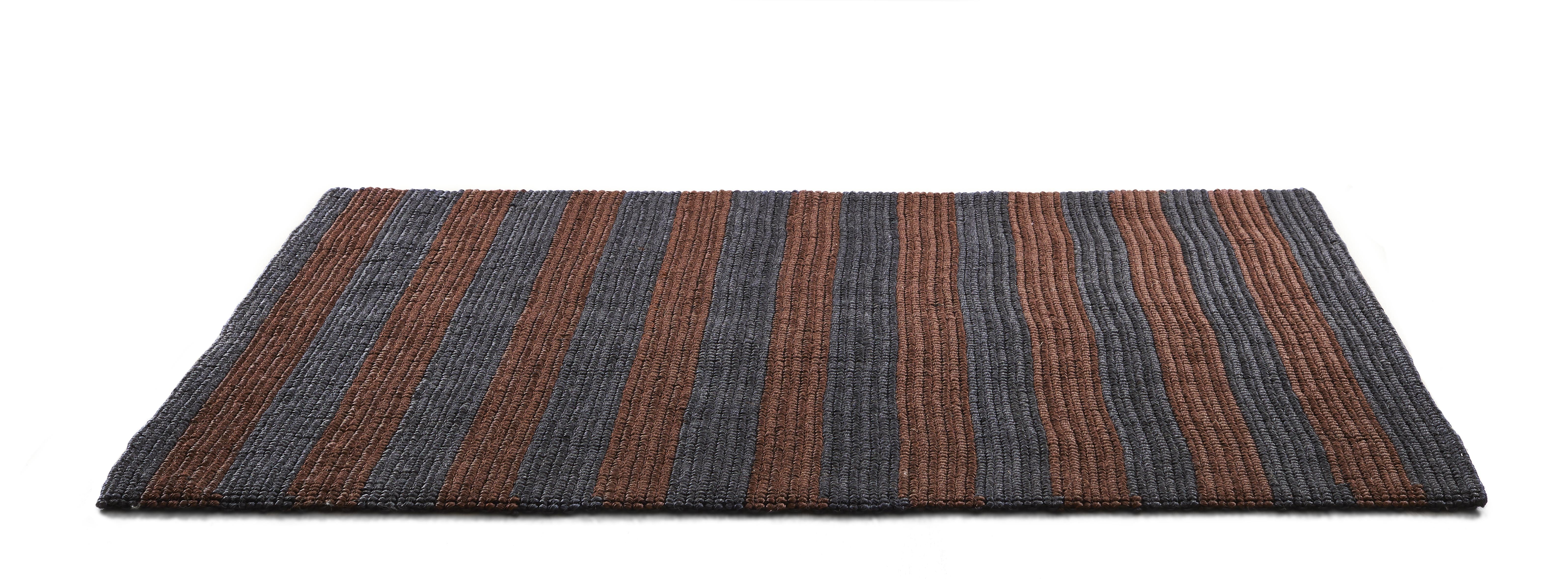 Large Par Raya rug by Sebastian Herkner
Materials: Fibres from Jipi palm leaves fibres. 
Technique: Naturally dyed fibers. Hand-woven in Colombia.
Dimensions: W 310 x L 420 cm 
Available in colors: cbrownish purple/ rust, flax/ kurkuma, black/