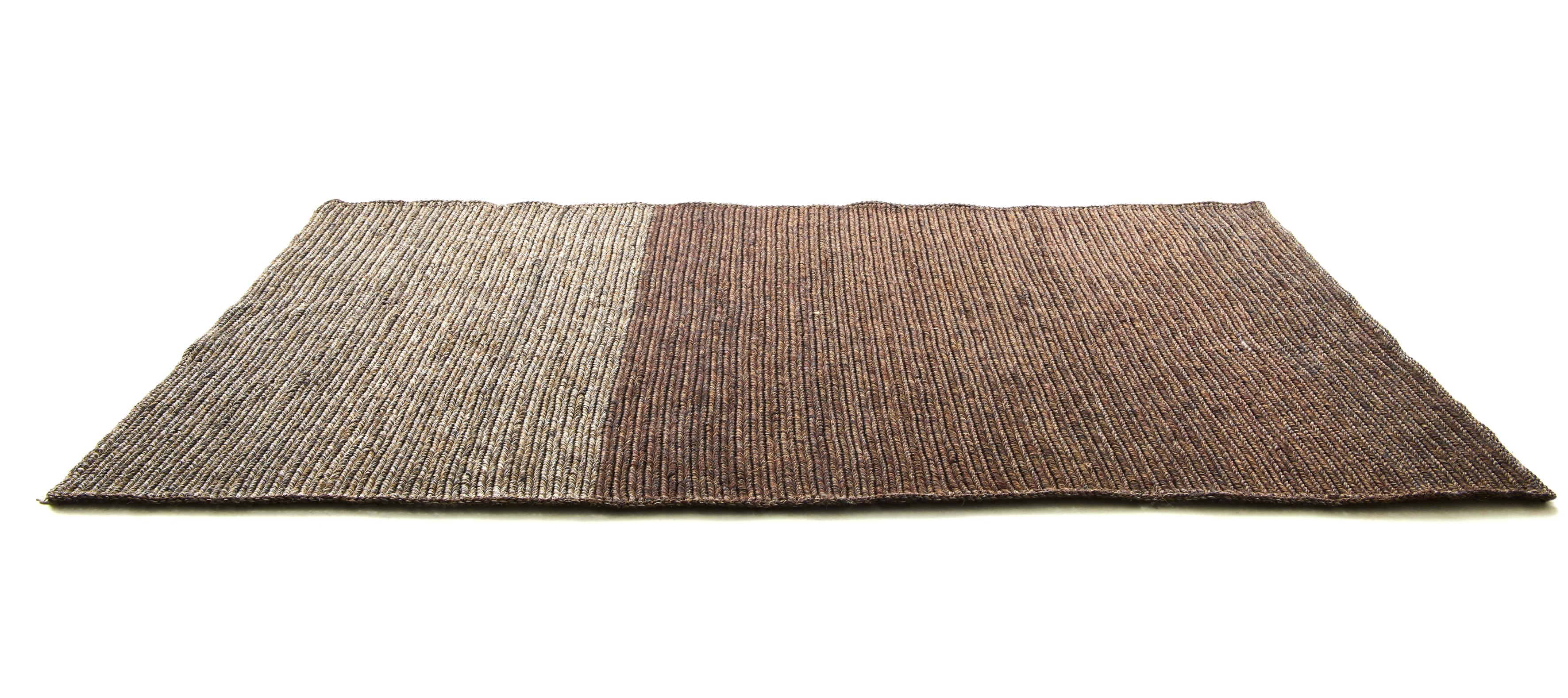 Large par rug by Sebastian Herkner
Materials: Fibres from Jipi palm leaves fibers. 
Technique: Naturally dyed fibers. Hand-woven in Colombia.
Dimensions: W 160 x L 224 cm 
Available in colors: cacao melange/ brown melange, light grey melange/