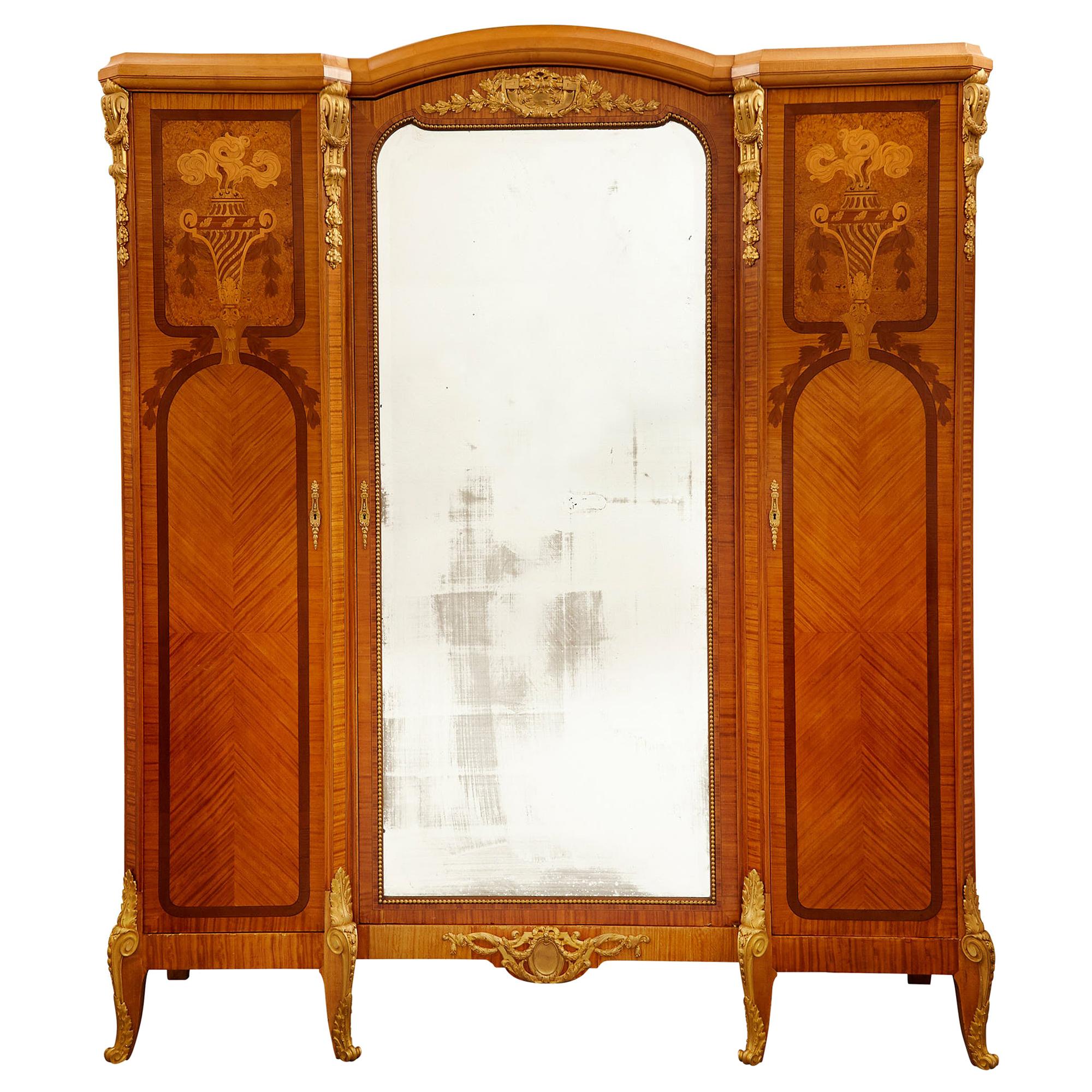 Large Parisian Wardrobe Adorned with Marquetry and Gilt Bronze For Sale