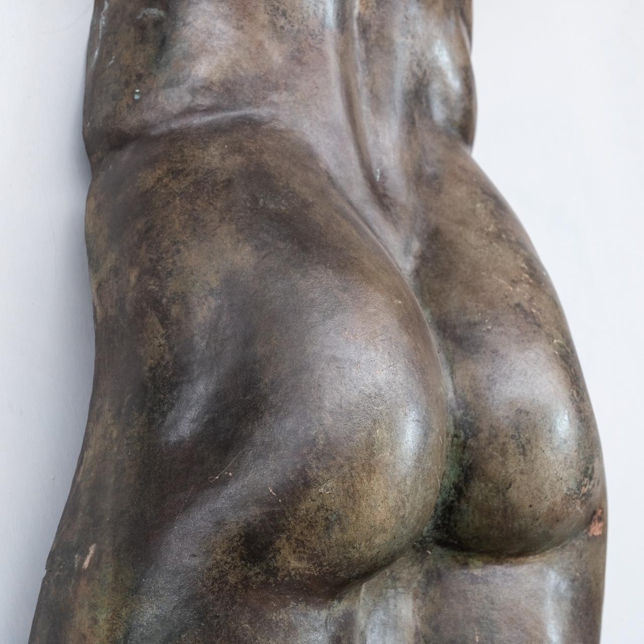 A well formed artist made sculpture cast of the male form. 

One of two pieces available. The reverse being sold in a separate listing. 

France, c1950s. 

Patinated brass. the sculpture can be wall hung. 

Location: Belgium