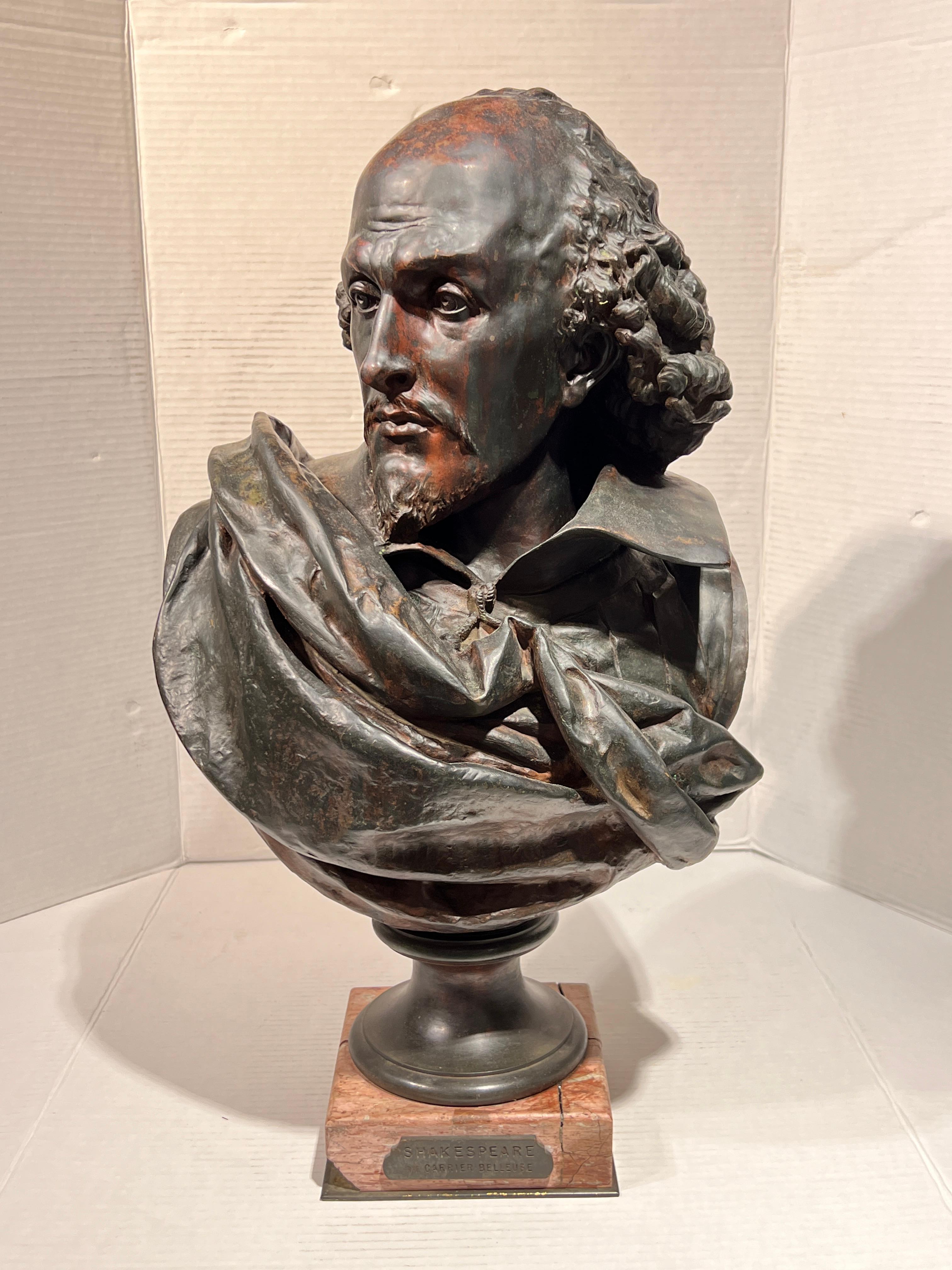 Large (22 1/2 inch tall) patinated bronze bust sculpture of William Shakespeare  after the original model by Albert Ernest Carrier Belleuse (1824-1887).  Cast by the Pinedo foundry of Paris, circa 1900.  With its original variegated marble base and