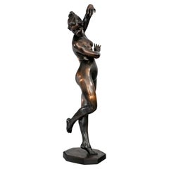 Grande figurine en bronze patiné d'une danseuse nue par Malvina Brach