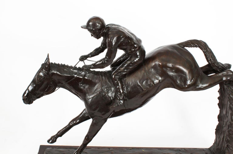 large-patinated-bronze-figure-of-docklands-express-by-philip-blacker