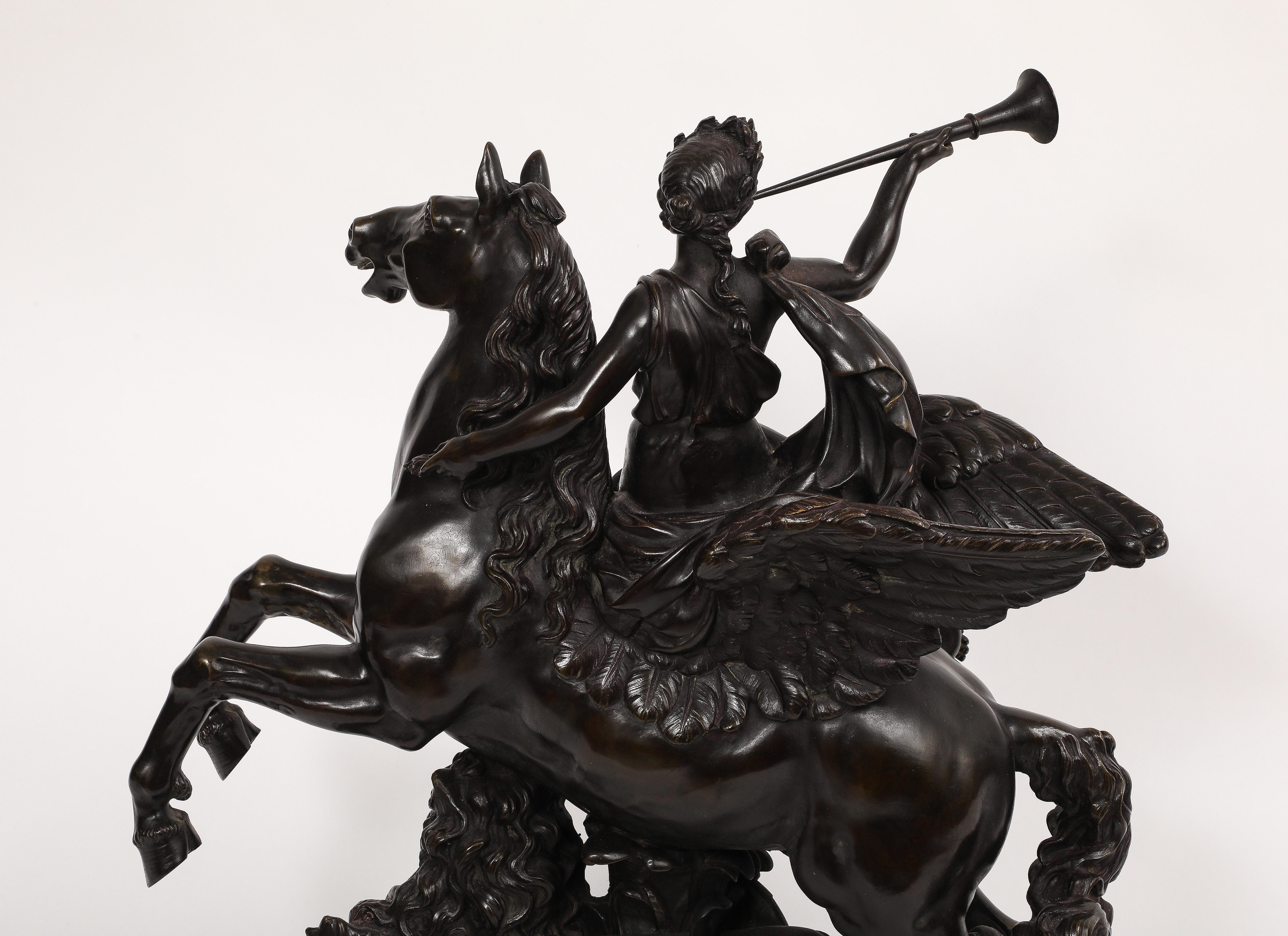 Large Patinated Bronze Group of Fame After the Model by Antoine Coysevox For Sale 2