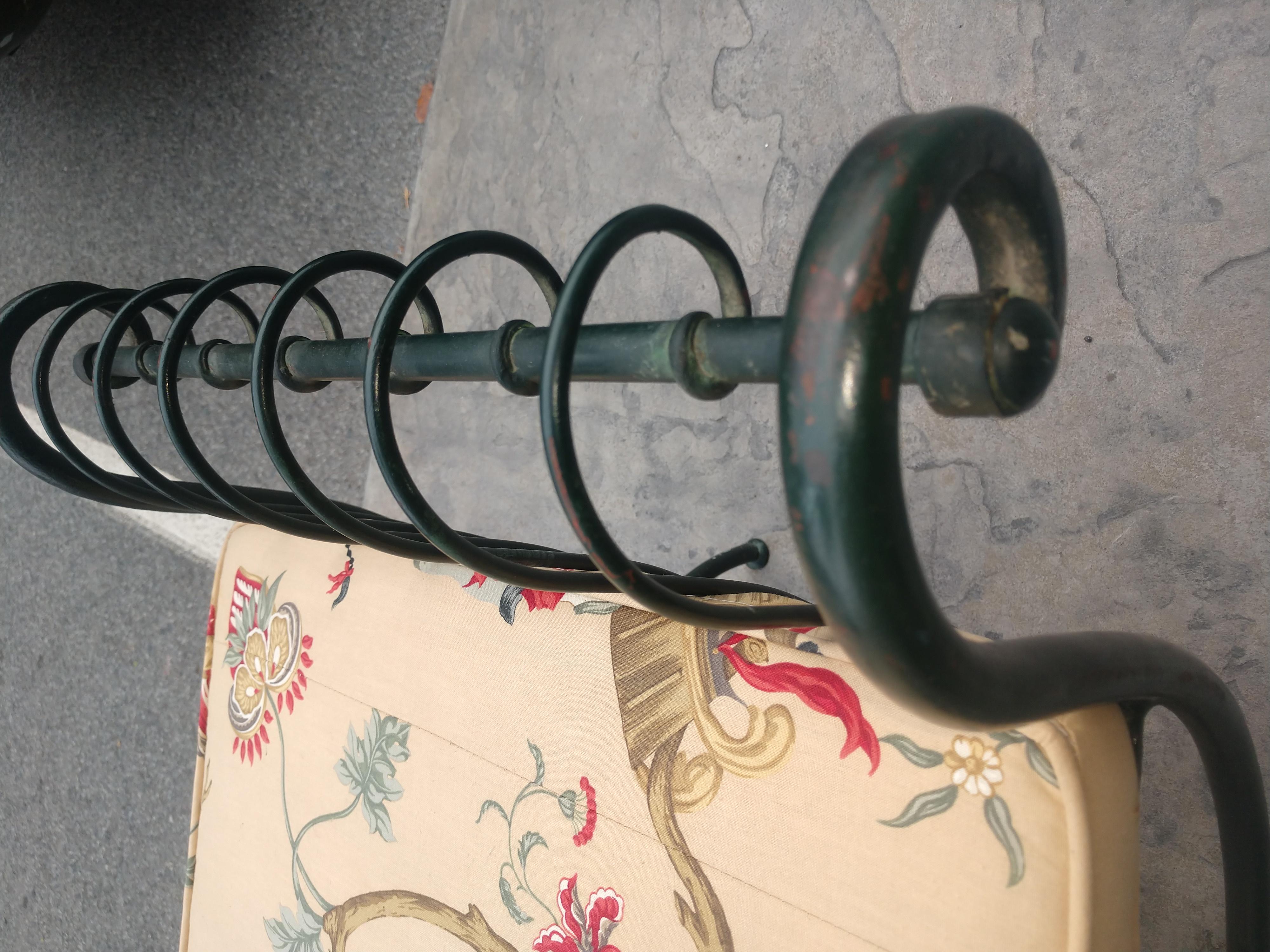 iron bench with cushion
