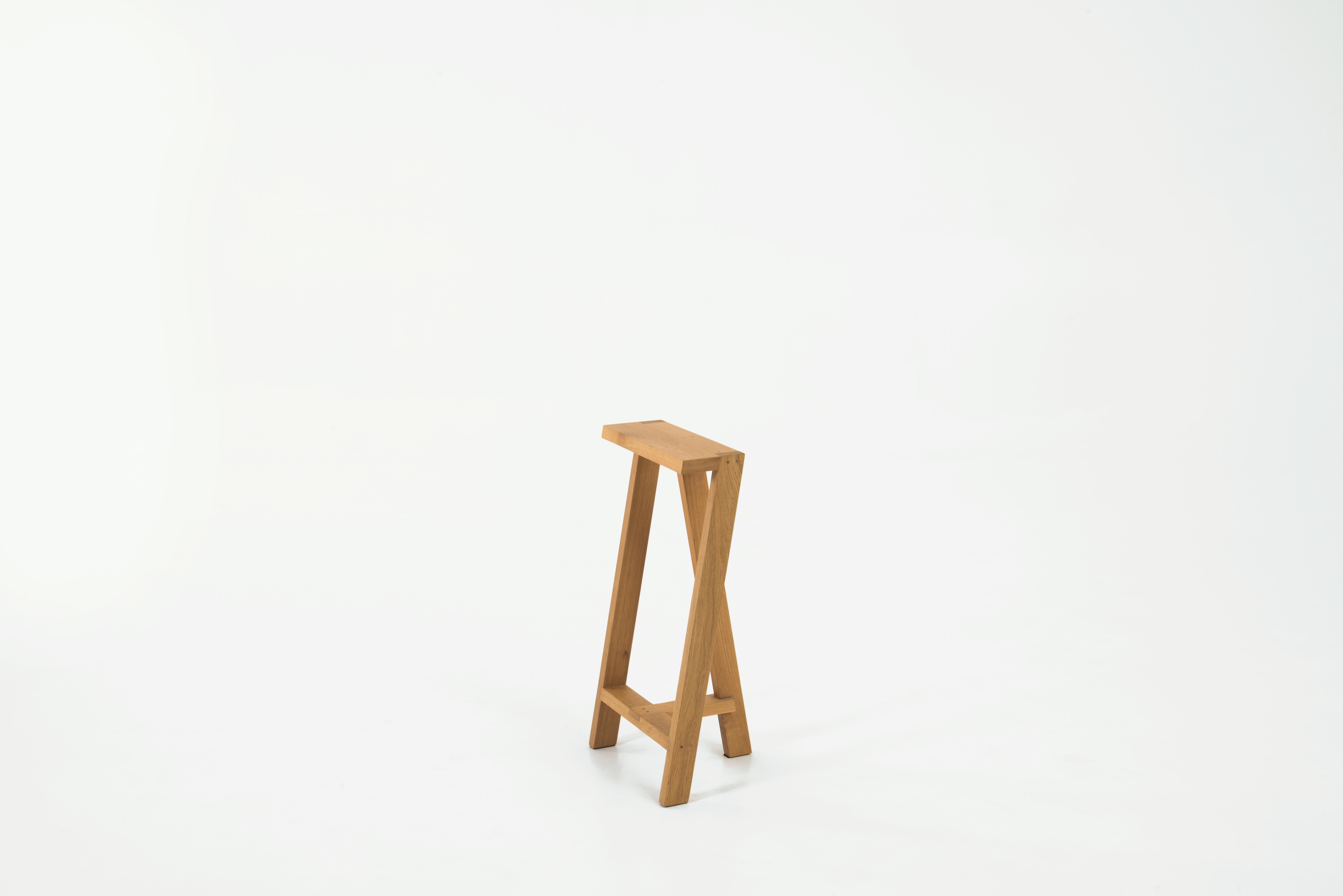 Large Pausa oak stool by Pierre-Emmanuel Vandeputte
Dimensions: D 32 x W 35 x H 80 cm
Materials: oak wood
Available in burnt oak version and in 3 sizes.

Pausa is a series of stools; 45cm, 65cm, or 80cm of assembled oak pieces. 
The narrow