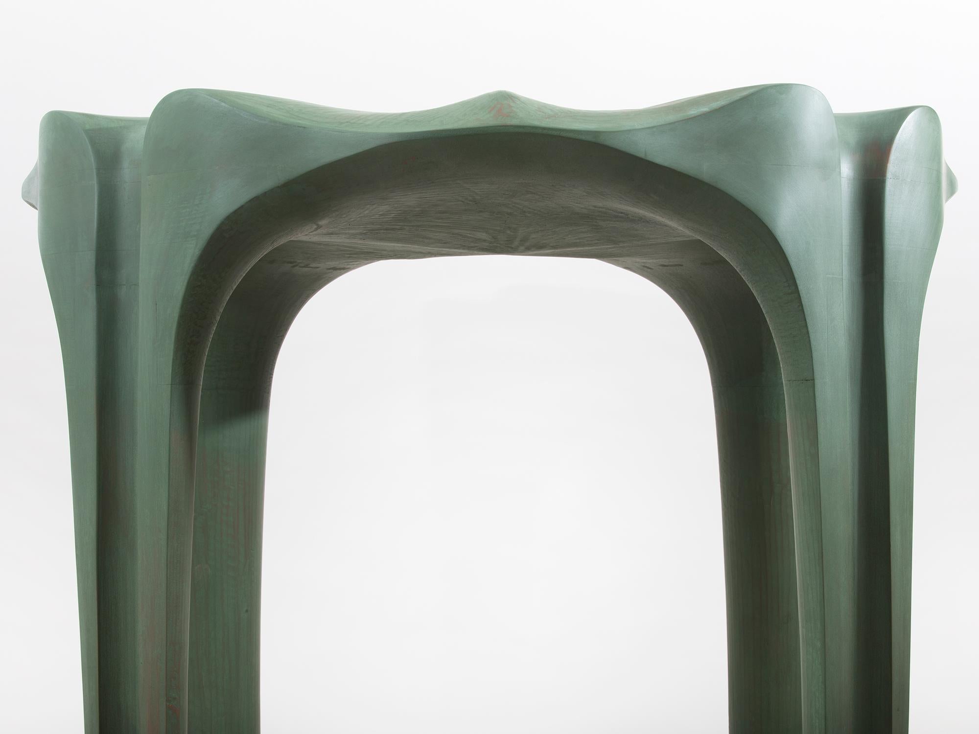 Large hand-carved and lathe-turned tulipwood sculpture with green milk paint finish, based on design details of Windsor furniture. Both anthropomorphic and architectural, it inverts the image of the chair and its intended use. Made by Hudson
