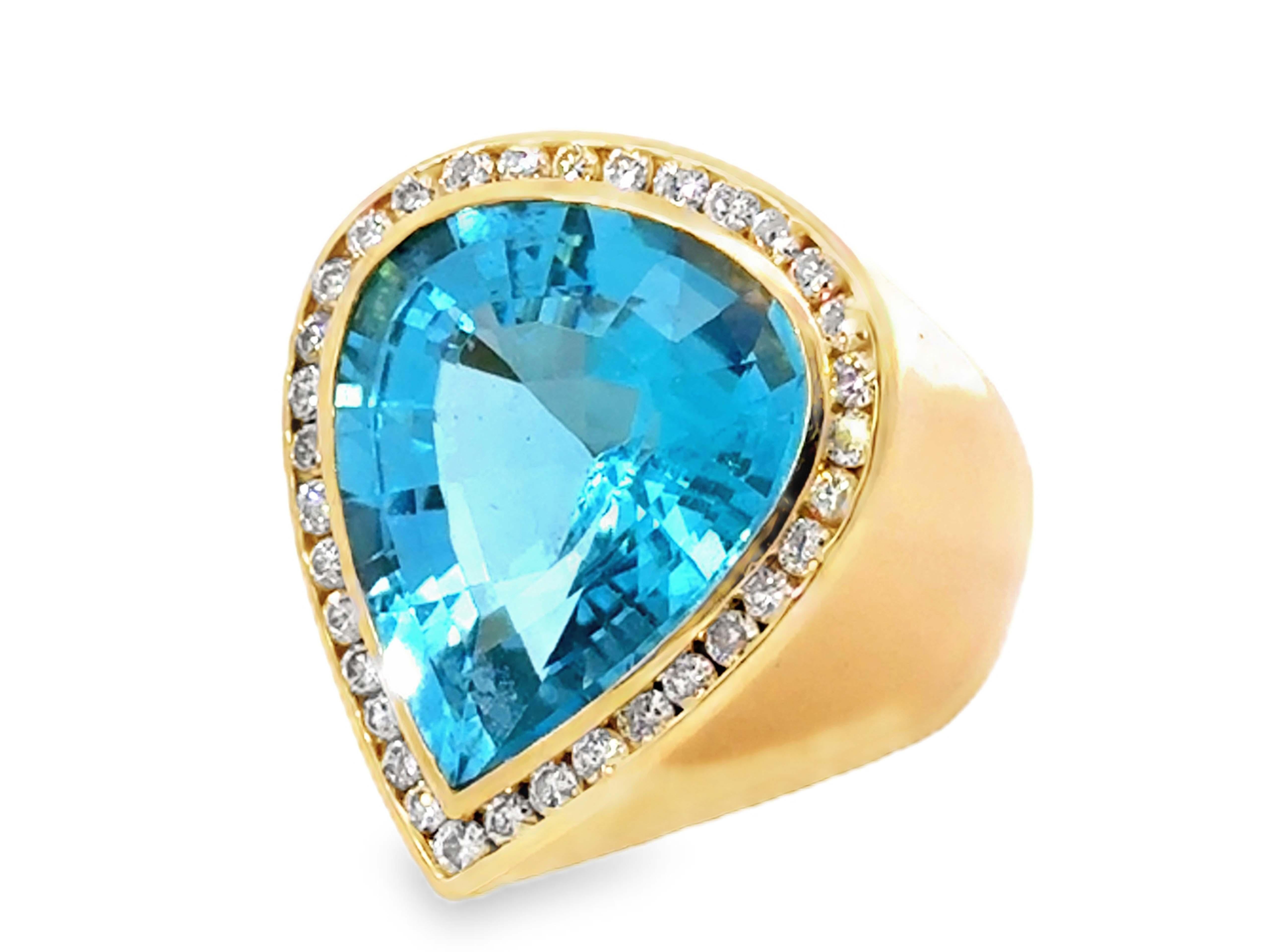 Grande anello a forma di pera con topazio blu e diamanti in oro giallo 18 carati In condizioni ottime in vendita a Honolulu, HI