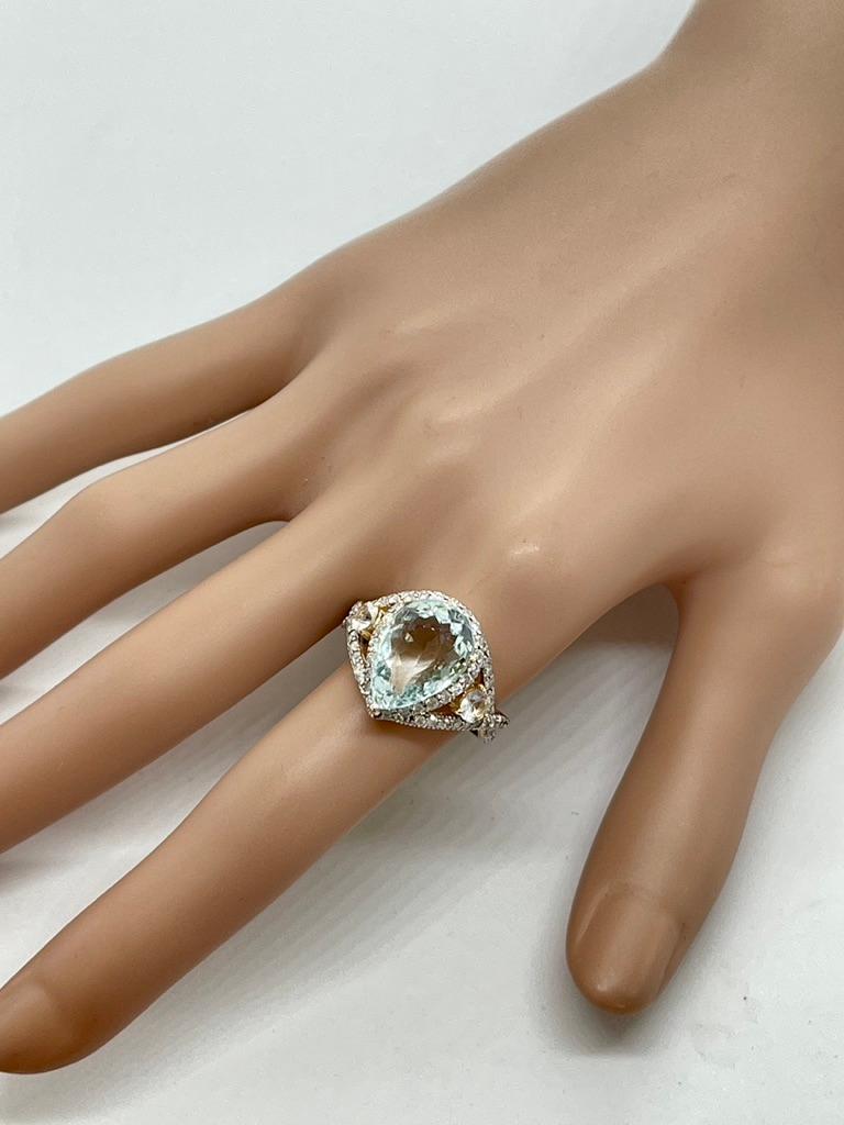 Großes birnenförmiges hellblaues natürliches Aquamarin-Diamant-Kleid-Ring Valuation im Angebot 3