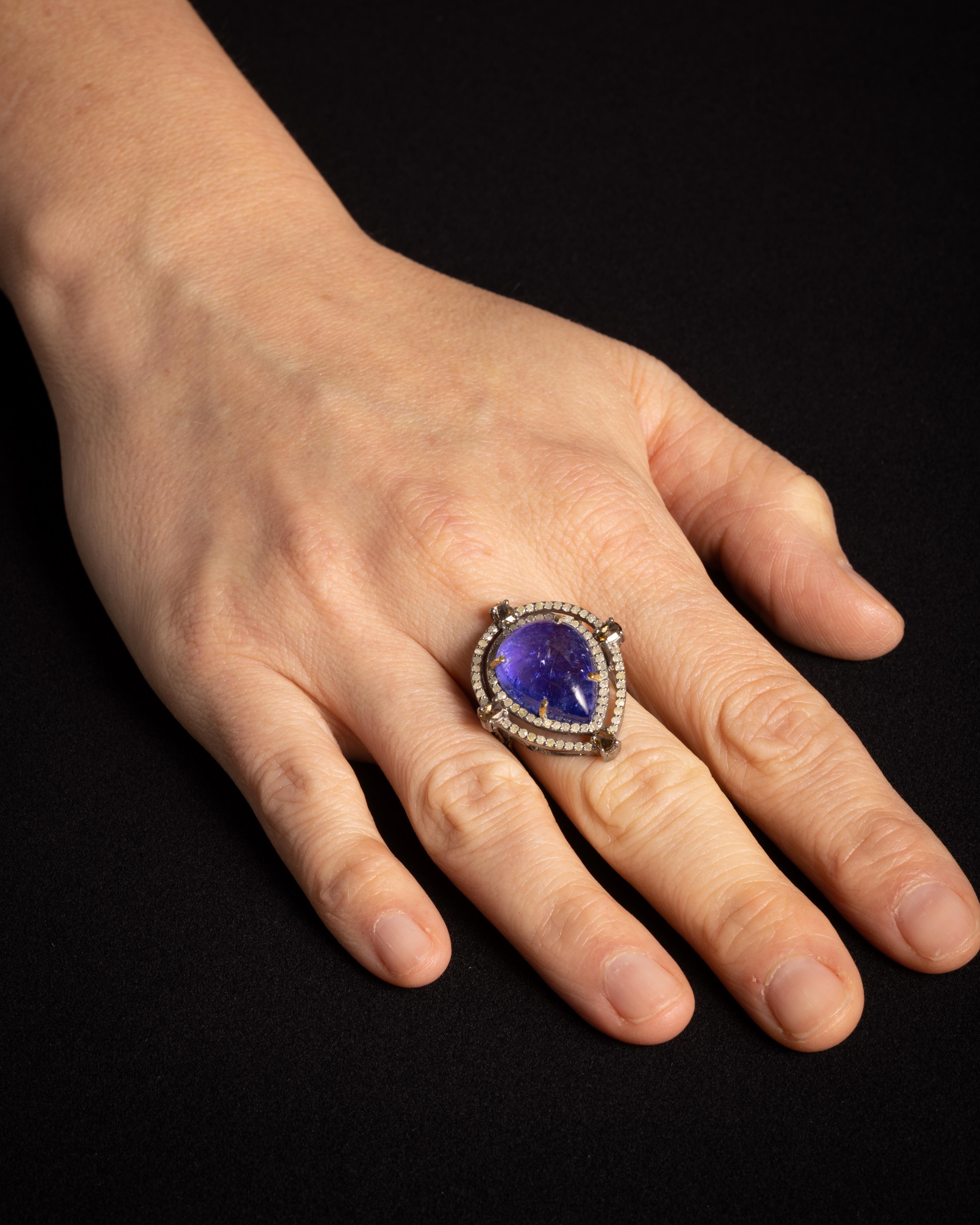 Women's or Men's Large Pear-Shaped Tanzanite Dome Cocktail Ring with Diamonds For Sale