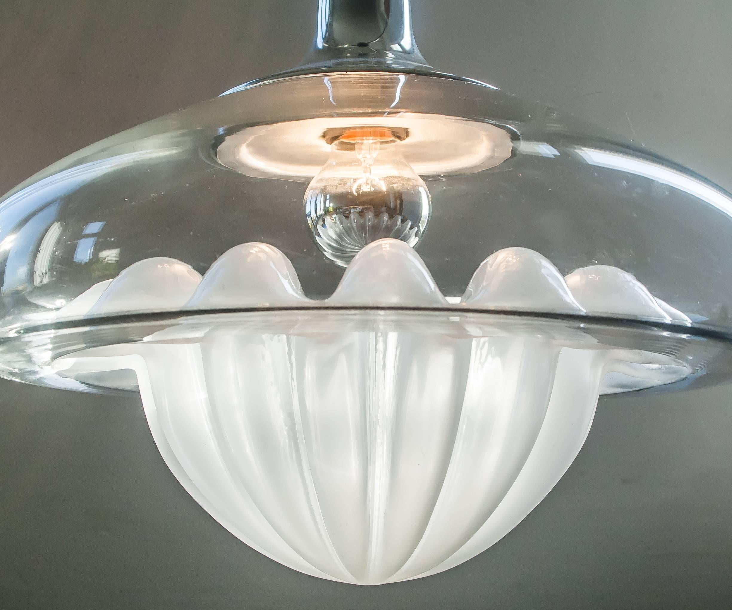 Single stunning mercury satin glass and polished nickel frame pendant light by Peill & Putzler of Germany, called the Lemon Press. Clear glass part has a dripping effect. See pictures. This light is very hard to find and a rare piece for